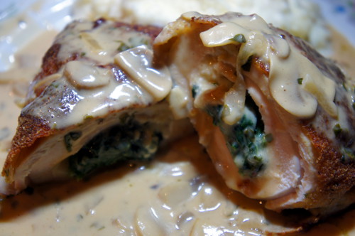 Chicken rollatine stuffed with broccoli rabe and covered in a Marsala wine sauce