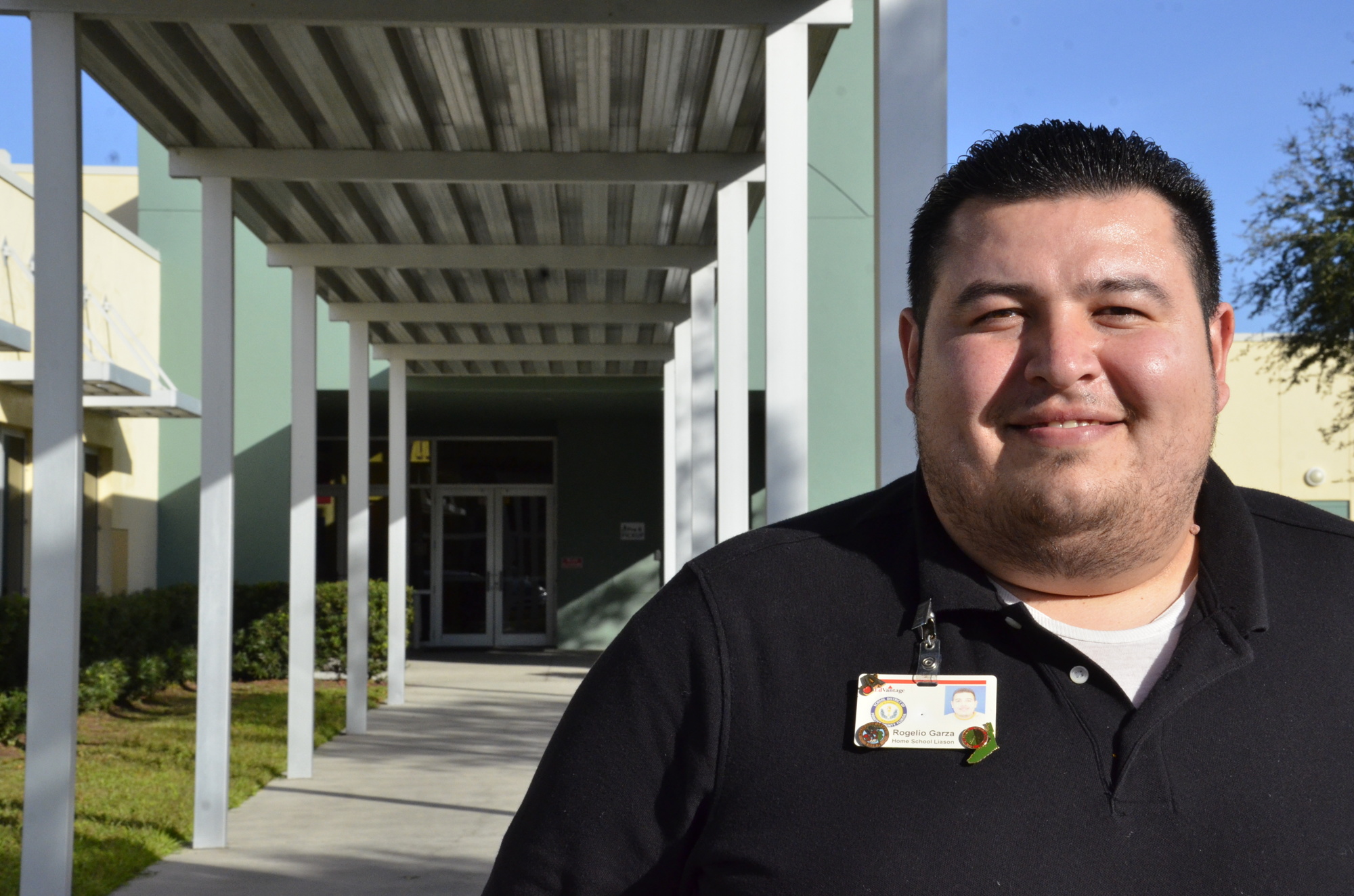 Roy Garza grew up as a migrant student and now is a home-school liaison between the Gilbert W. McNeal Elementary and the families of migrant students.