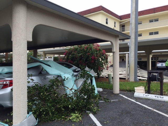Several cars were damaged in the area from the tornado, which passed through the Excelsior Gulf to Bay condominums
