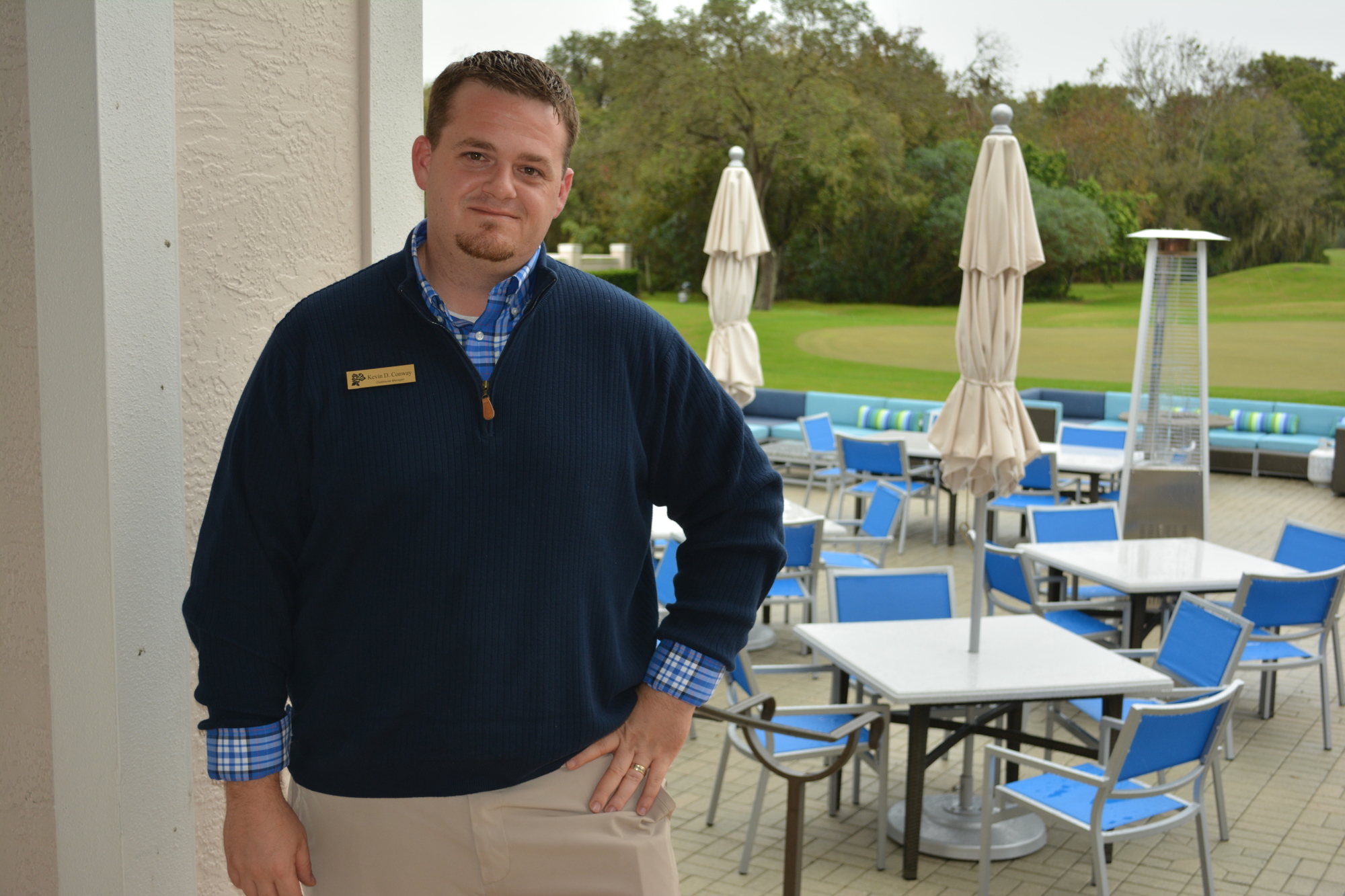 Kevin Conway, the clubhouse manager at Rosedale Golf and Country Club, stands in front of new patio furniture needed to create a casual environment for the members.