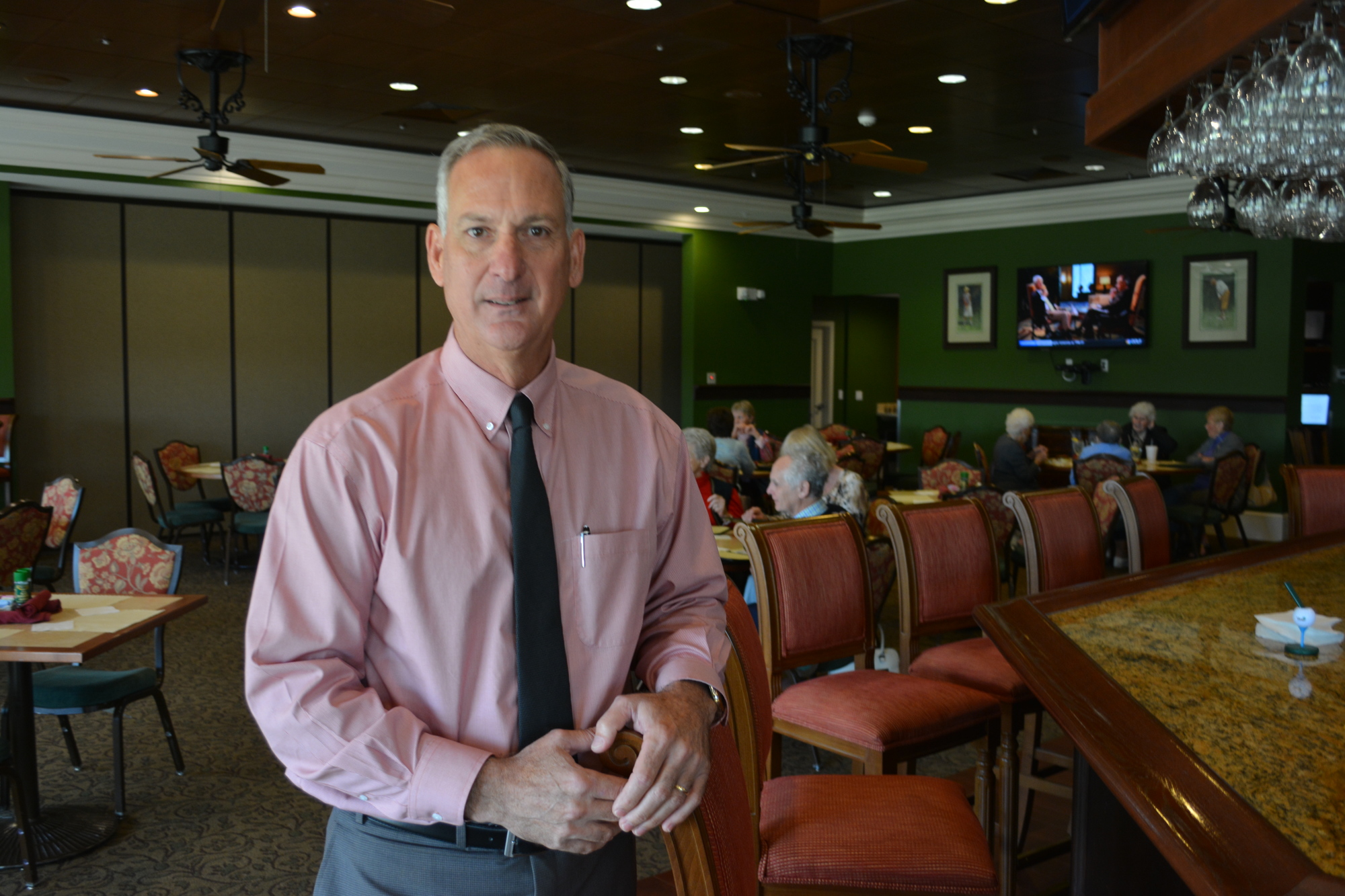 Anthony Greising, the Tara Golf and Country Club general manager, stands next to an expanded grill area that was needed to meet his members' desire for casual dining.