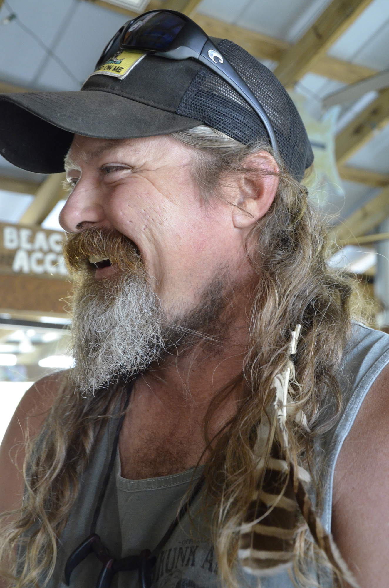 Dusty Crum keeps a feather in his hair, partially as a joke. Once when riding his bike, a hawk swooped down at an inopportune moment and Crum got a plethora of feathers stuck in his long hair.