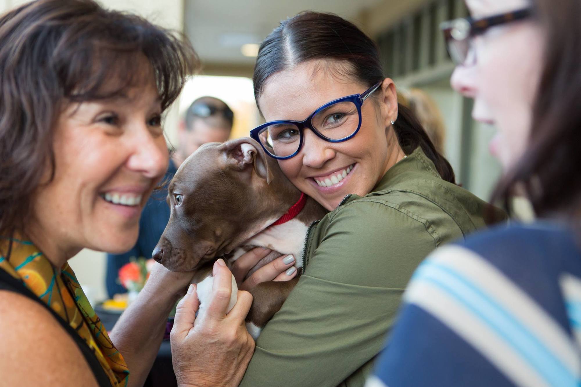 Jennifer Matteo adopts a puppy rom Satchel's Last Resort at 