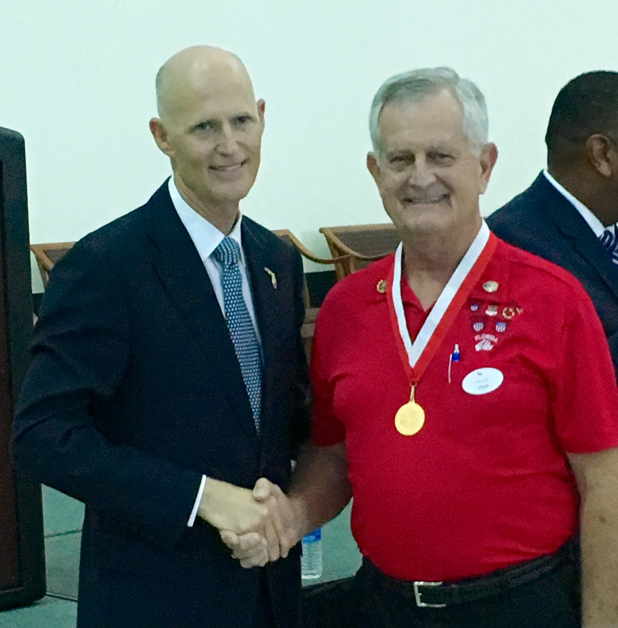 Gov. Rick Scott with Steven Carruthers
