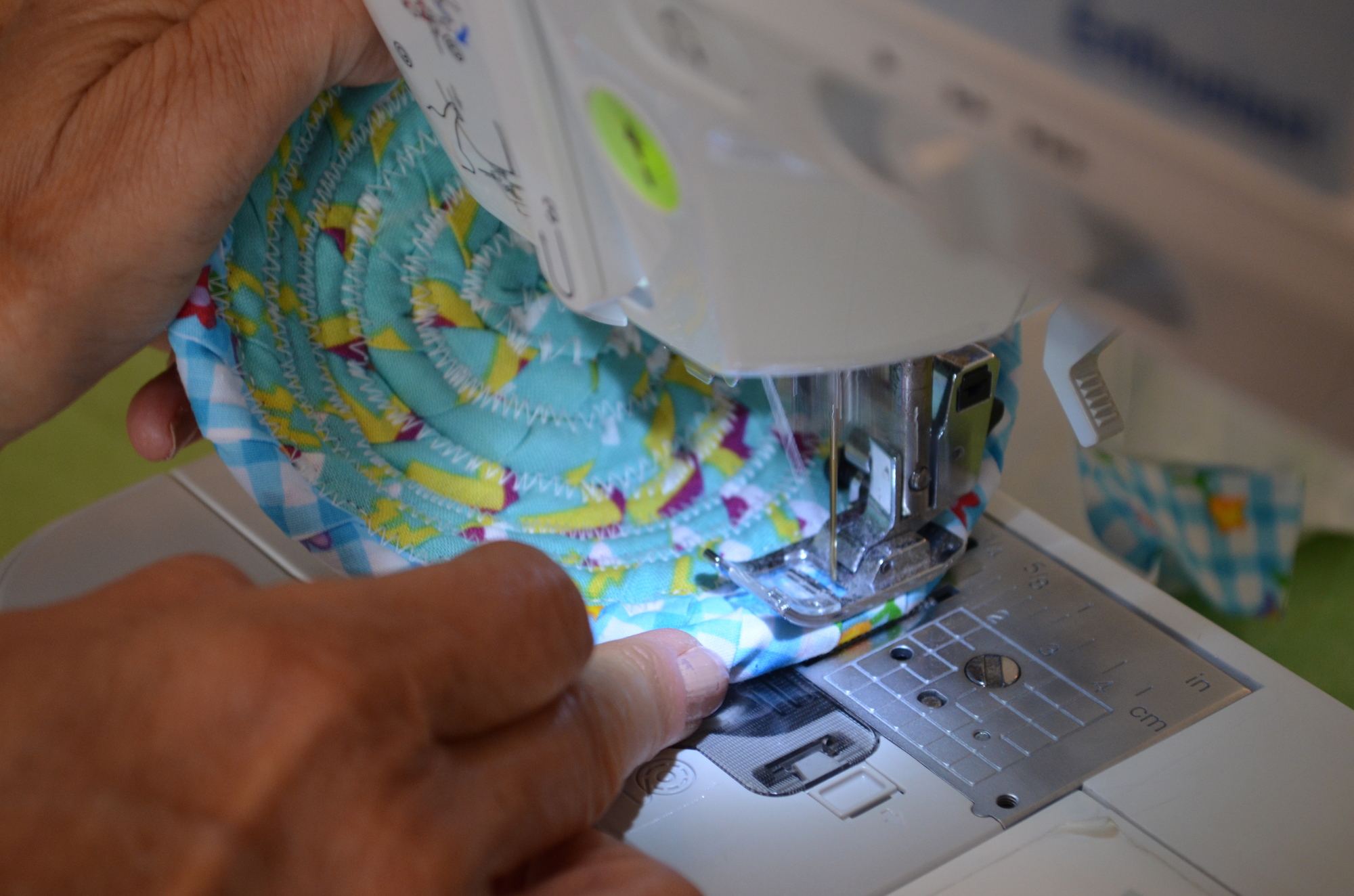 A zigzag stitch is required to keep the coils connected for fabric pottery.