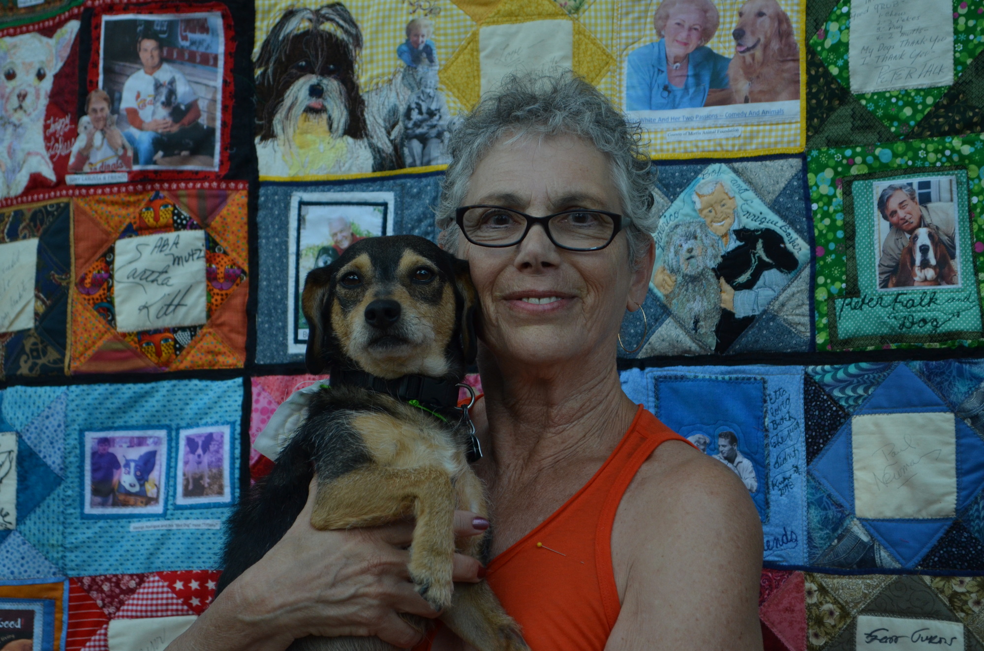 Artist Joan DaVanzo with her adopted pooch Sparky.
