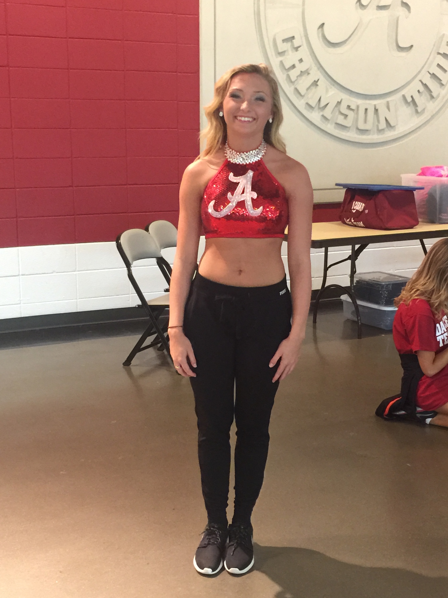 After earning a spot on the Crimson Cabaret dance team, Alexsa Dietrich shows off her new university colors.