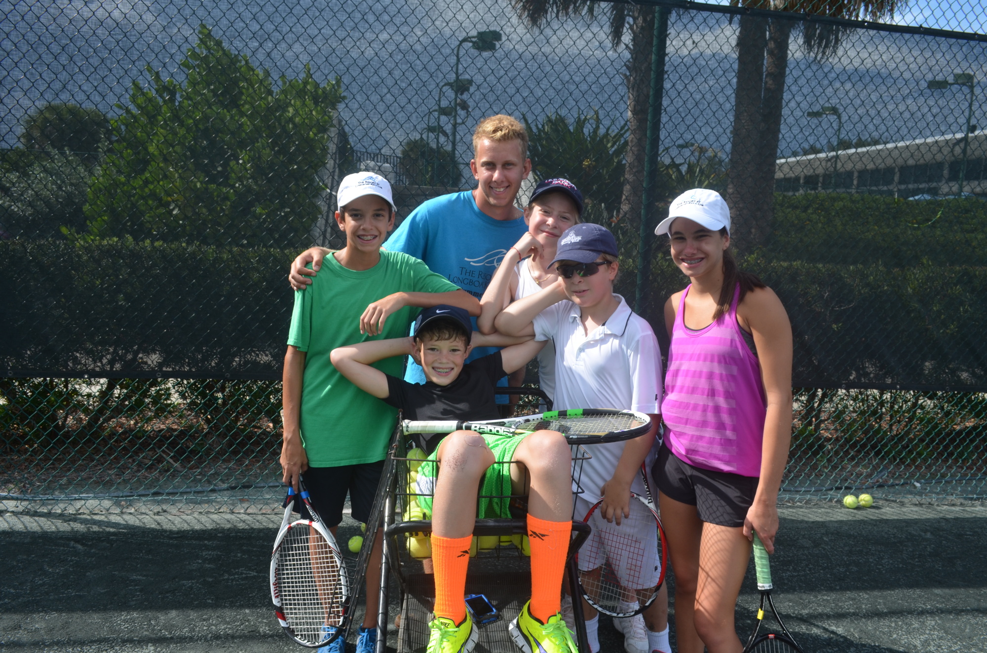 Everett Philipson, 12, Joey Carter, 10, coach Brett McDurfee, Alexia Pasold, 11, Max Pasold, 9, and Eugenie Philipson, 15, at last year's tennis camp at the Resort at Longboat Key Club.