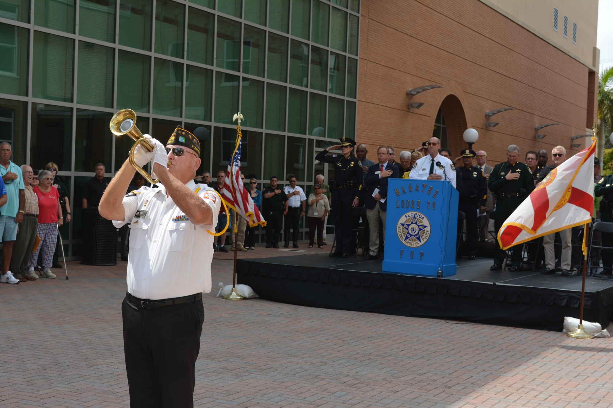 Bugler Jerry Gallagher of VFW Post 10141 played 