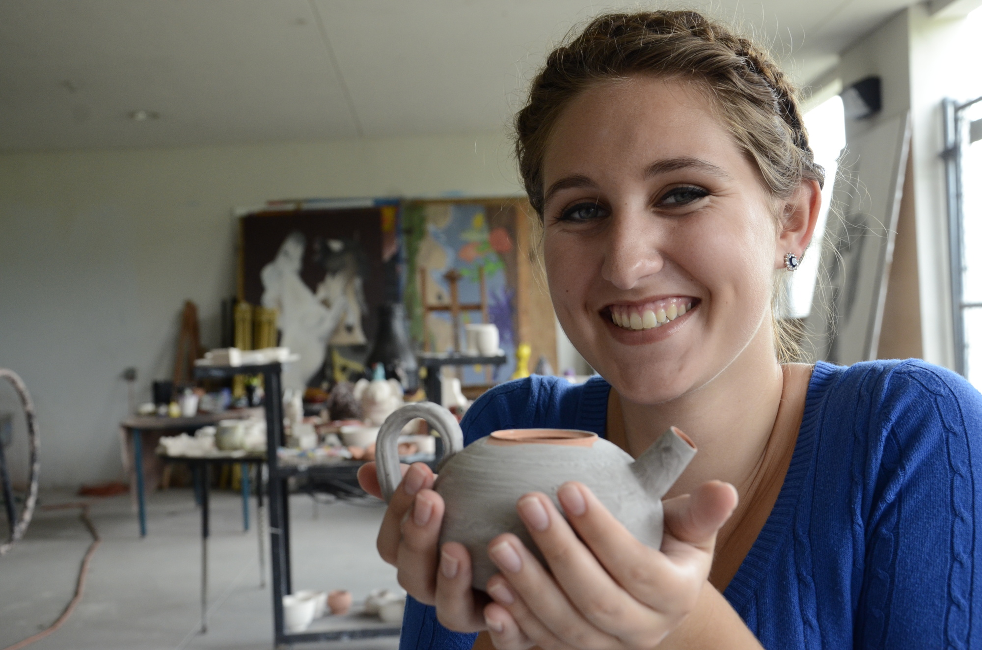 Chloe Gingerich finished a tea set for her mother just before graduation.