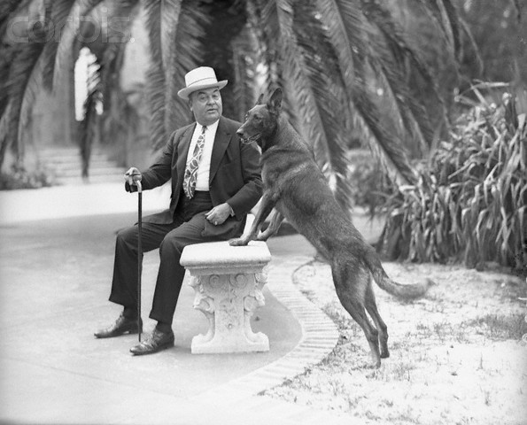 John Ringling with one of his dogs.