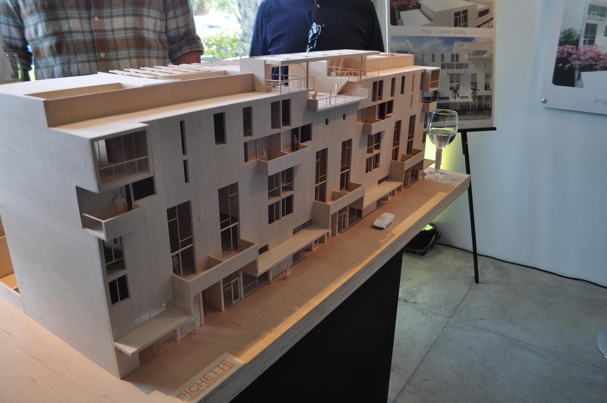 The crowded gathering to celebrate Risdon’s work in the Rosemary District featured a model of the Risdon on 5th project, slated for completion next year. 