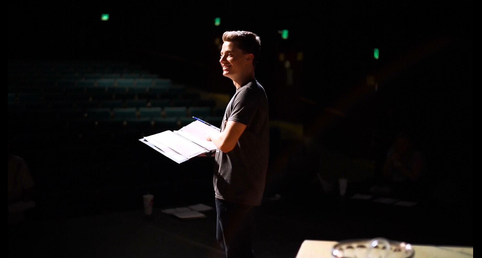 Playwrights work with actors to bring their scripts to life.