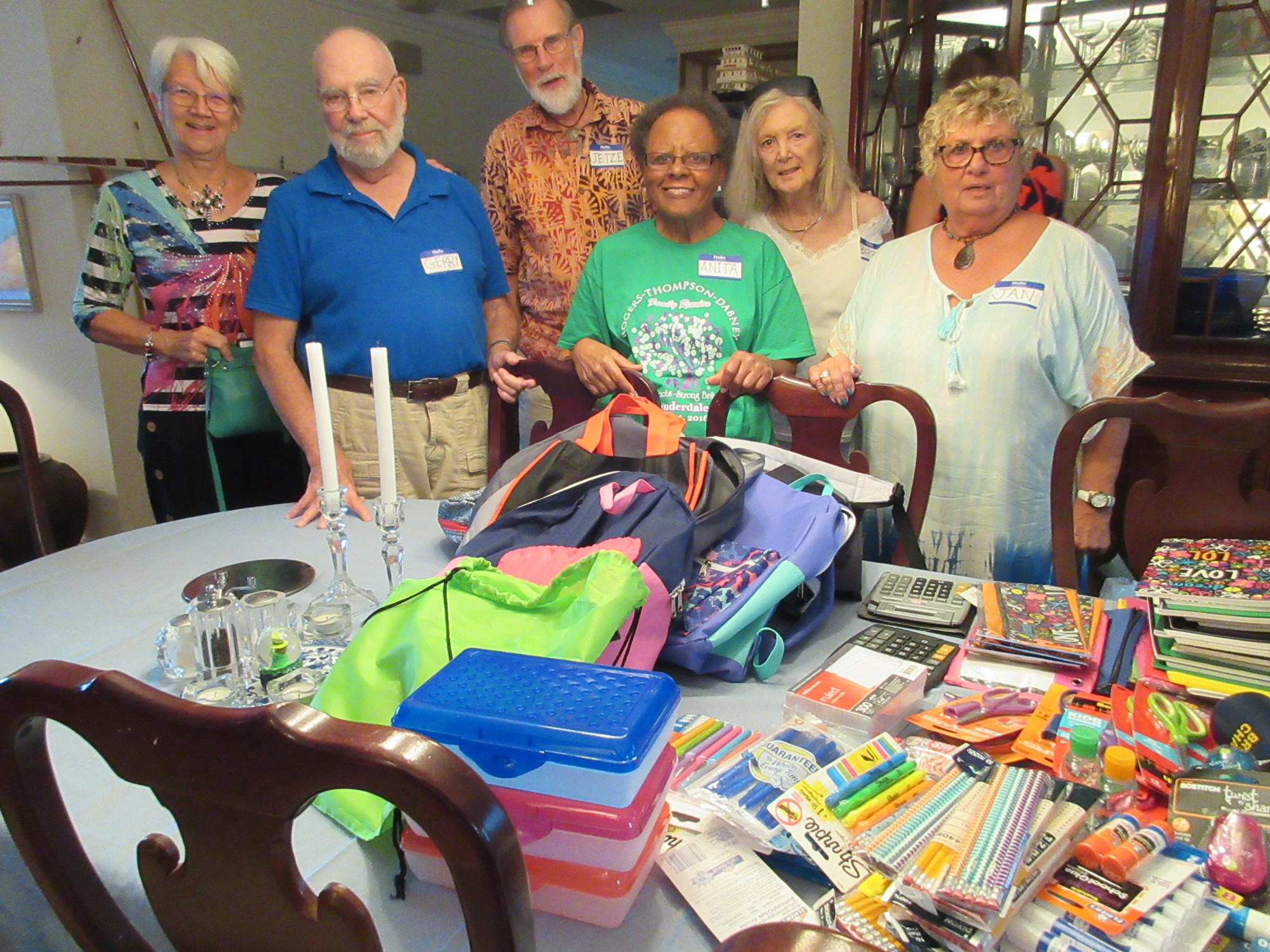Courtesy photo. Members of Returned Peace Corps Volunteers of Gulf Coast of Florida gathered school supplies at a recent group barbecue.