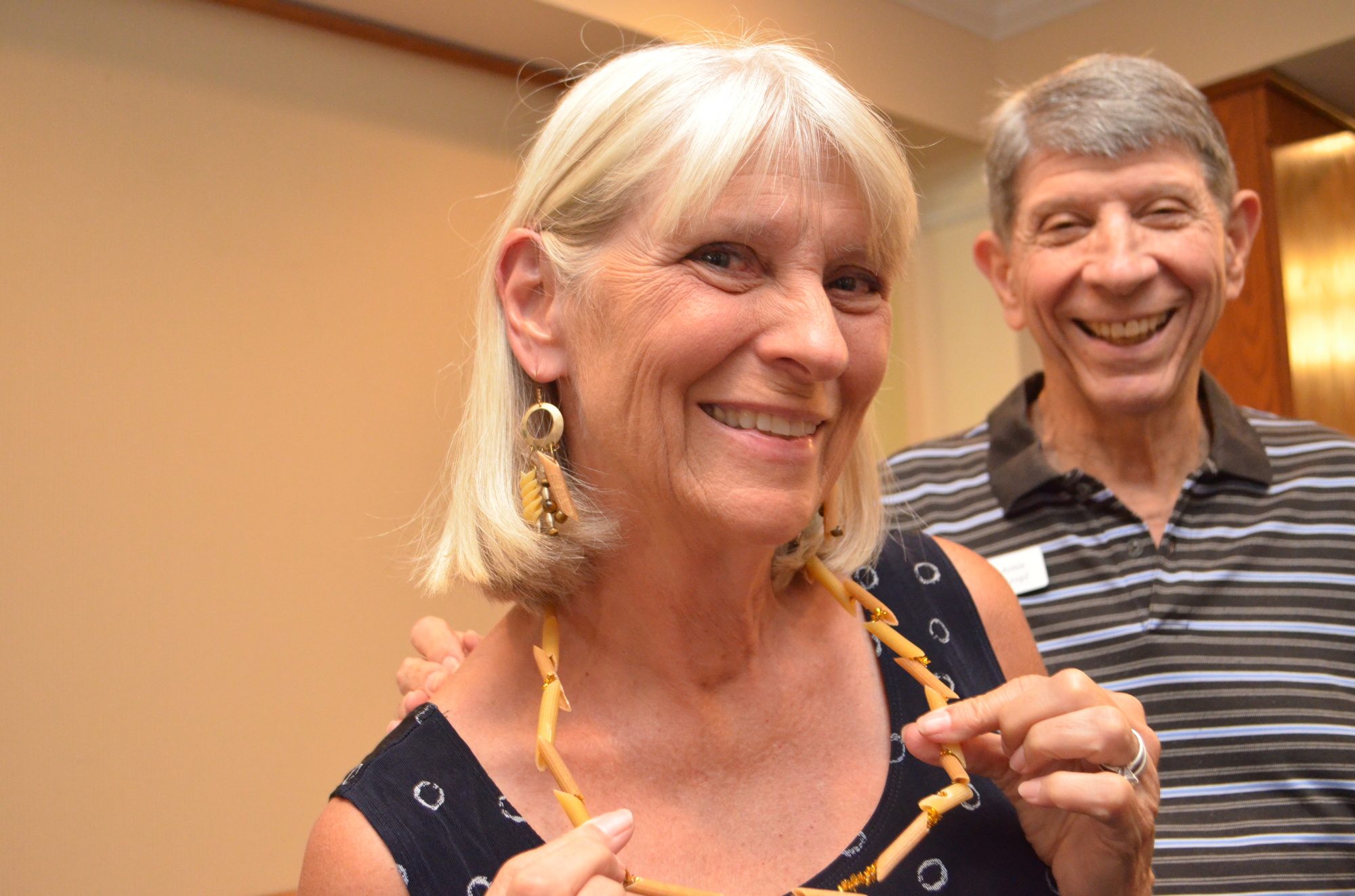 Dee Kropf shows off her penne necklace and pasta earrings.
