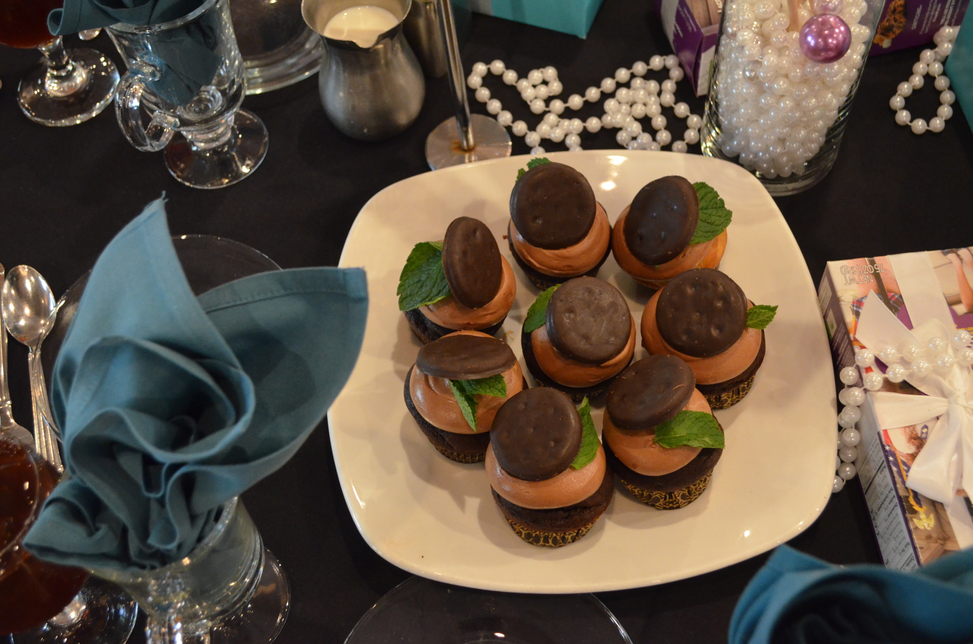 Chocolate cupcakes with chocolate frosting and a Girl Scout Thin Mint cookie garnish were served for dessert at the Little Black Dress with Pop! Fashion Show and Luncheon at Michael's On East on Friday, July 22.