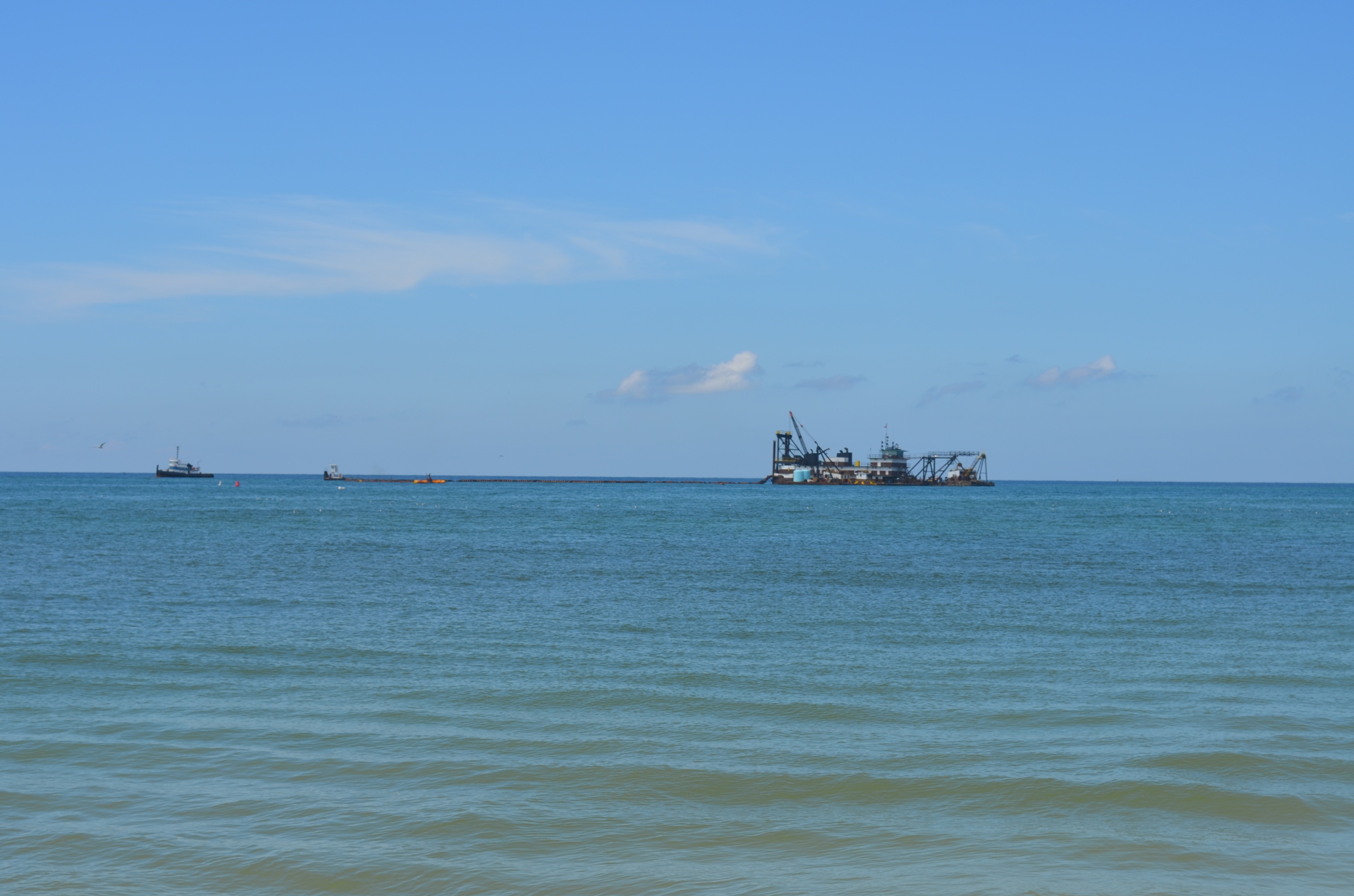 The dredge Pullen has left Longboat Pass for safe harbor in Tampa.