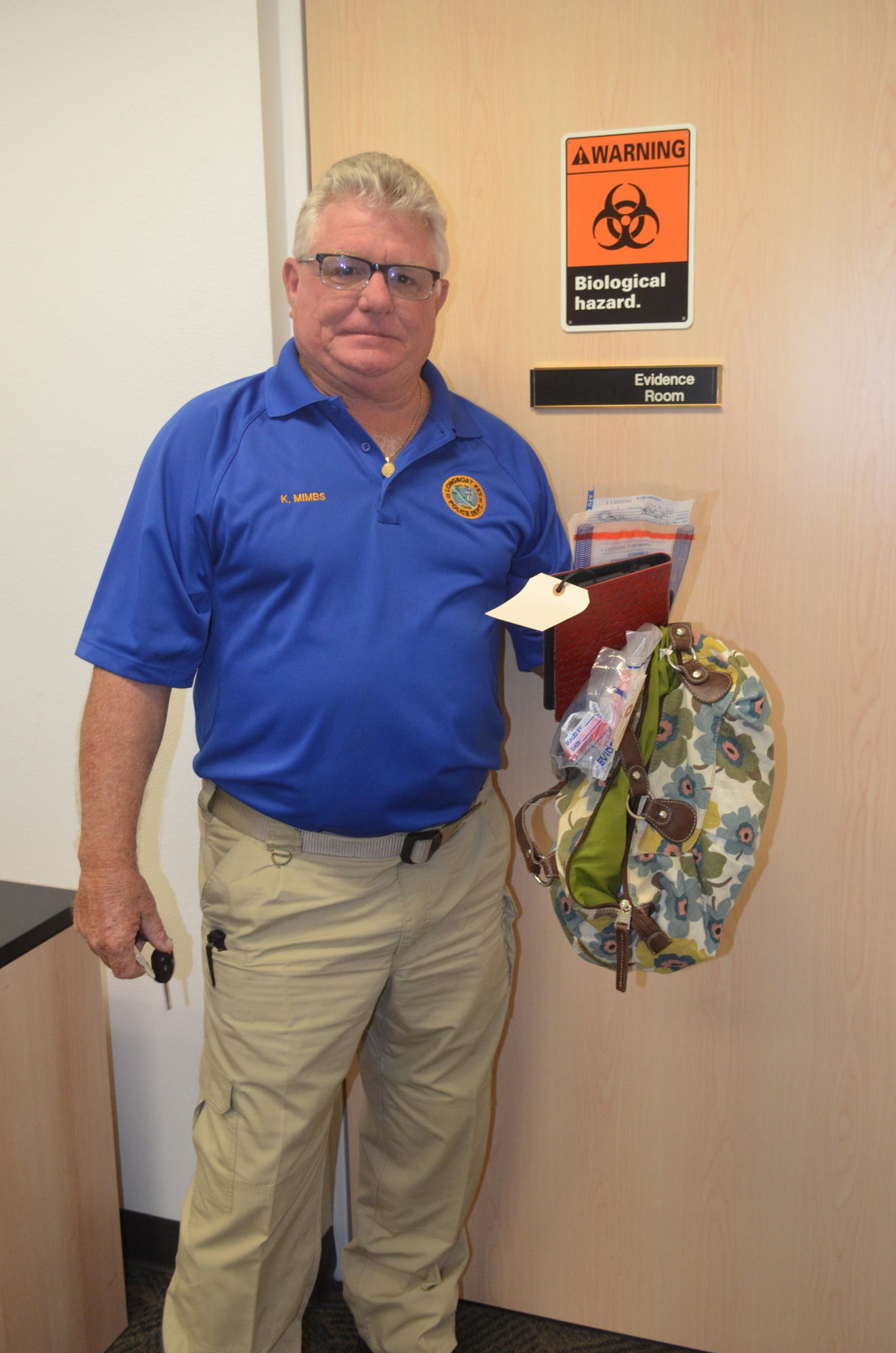 Kevin Mimbs of the Longboat Key Police Department is point man in trying to reunite owners with lost property.