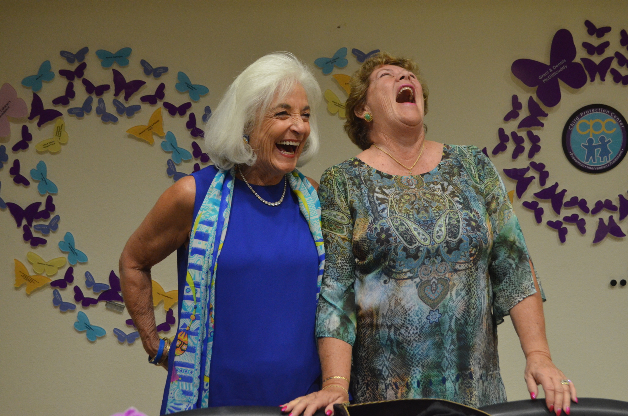 Graci McGillicuddy laughs with Judy Barnhart. Photo by Niki Kottmann