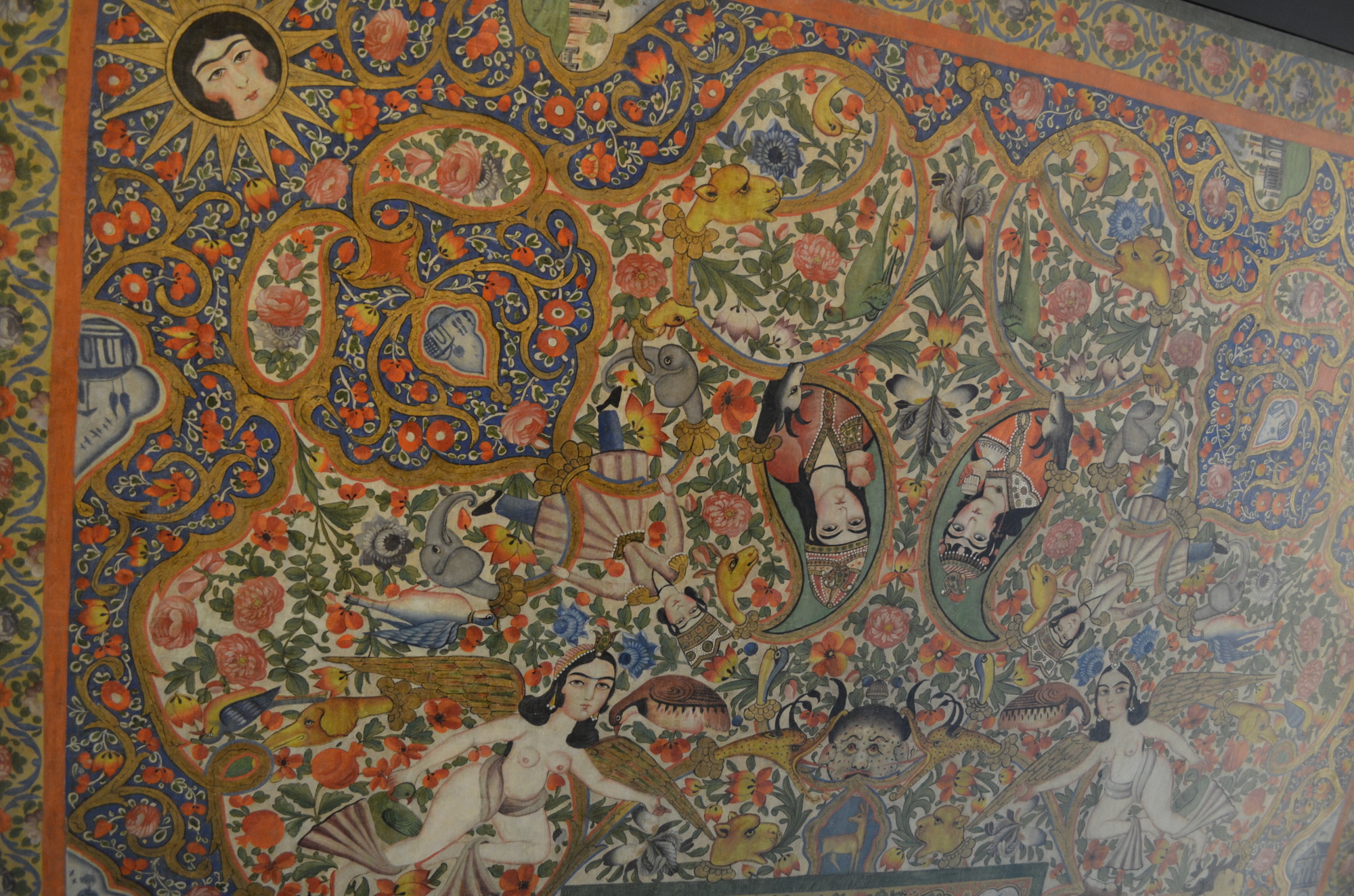 A 19th-century Persian ceiling painting required labor-intensive restoration and installation.