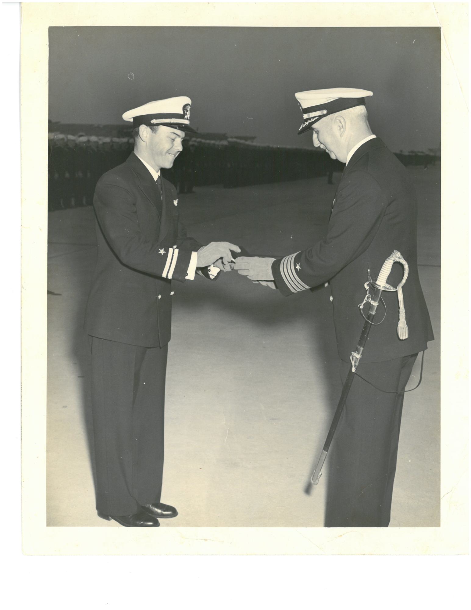 Lt. Gordon Bolser receives his Navy Cross from Capt. Mason in April 1942. Photo courtesy of Shannon Gault.