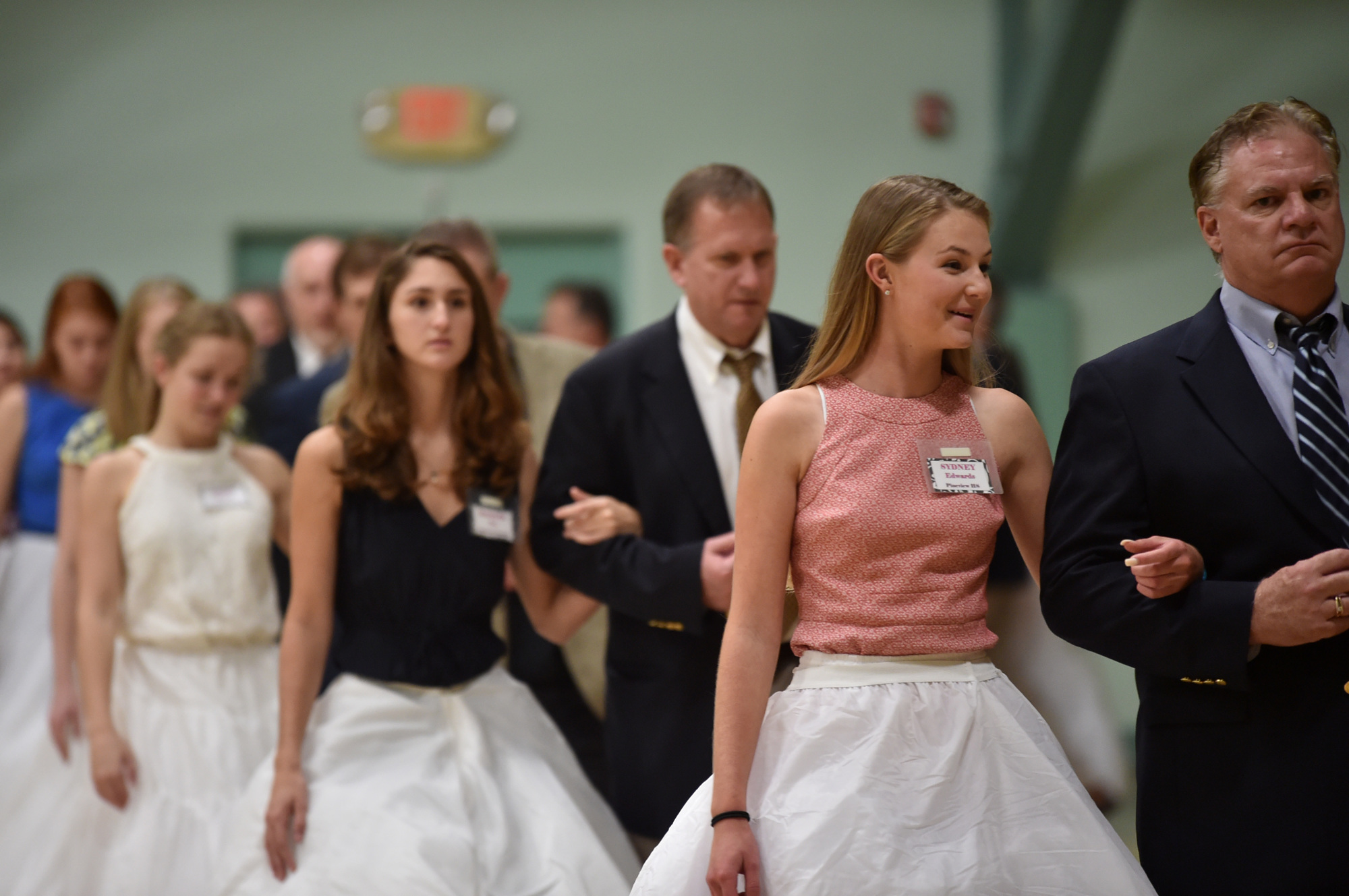2016 debutantes practice their father-daughter waltz at Municipal Auditorium Dec. 7. Photo courtesy of Billy D Photography