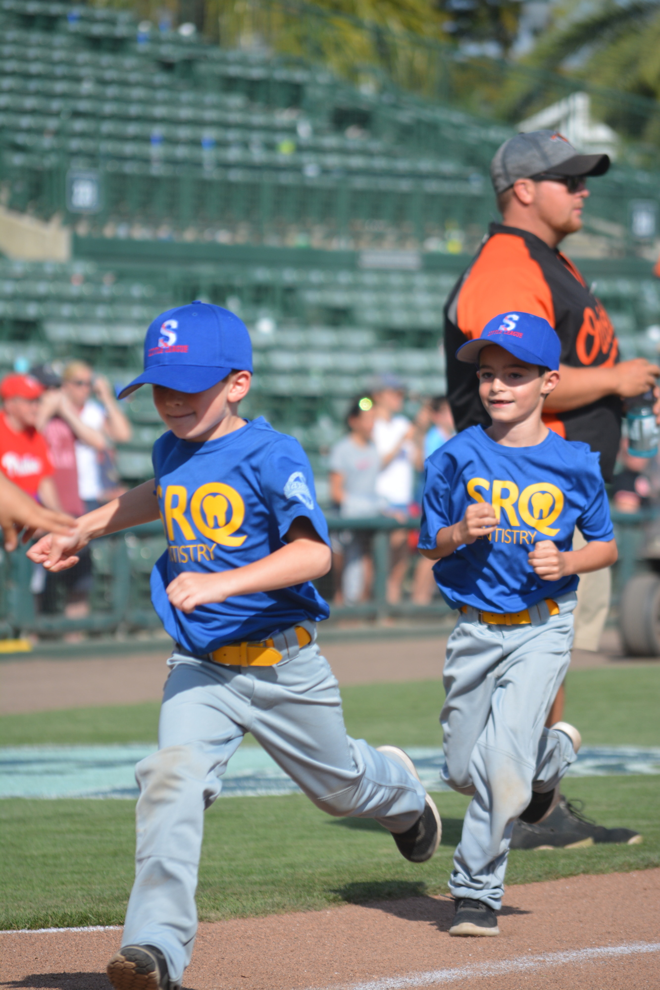 Sarasota Little Leaguers run the bases.