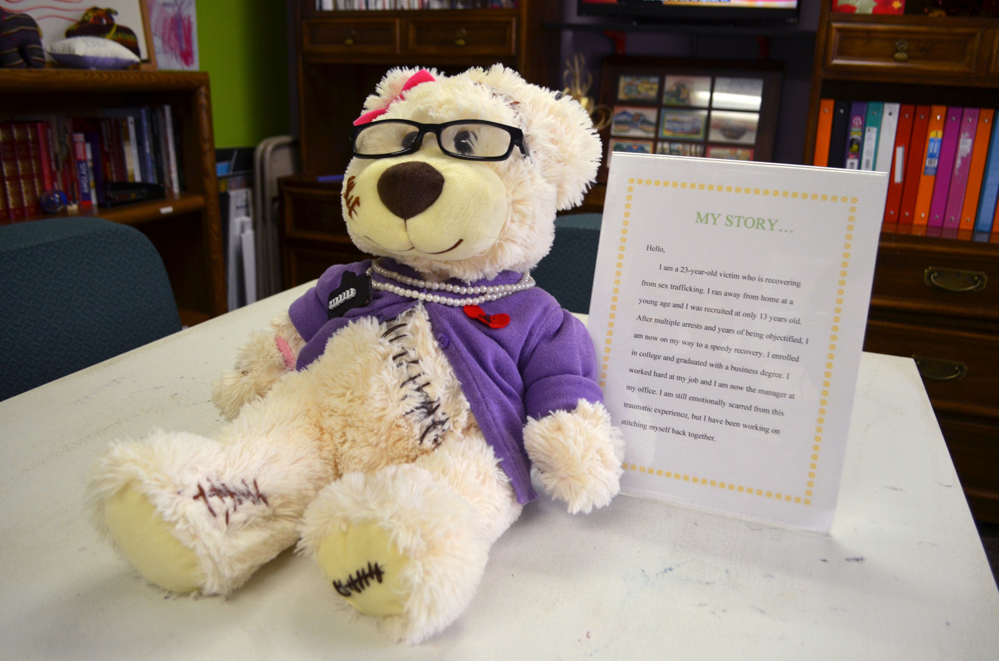 This teddy bear, designed by a student at Ringling College of Art and Design, symbolizes the transformation of a 23-year-old survivor who went from victim to college graduate to manager of her office. Photo by Niki Kottmann