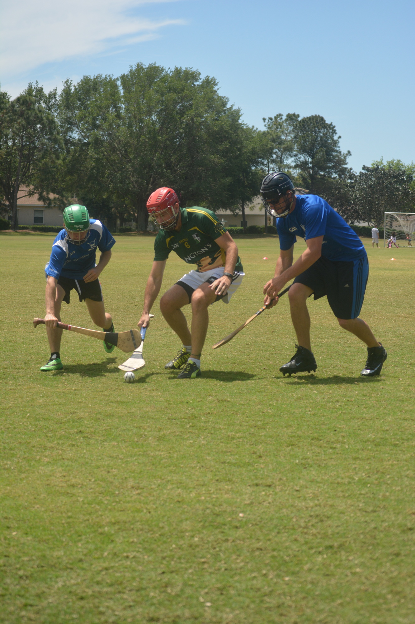 Tim Boyll, Austin Rushnell and Zack Mozina battle for a ground pass.