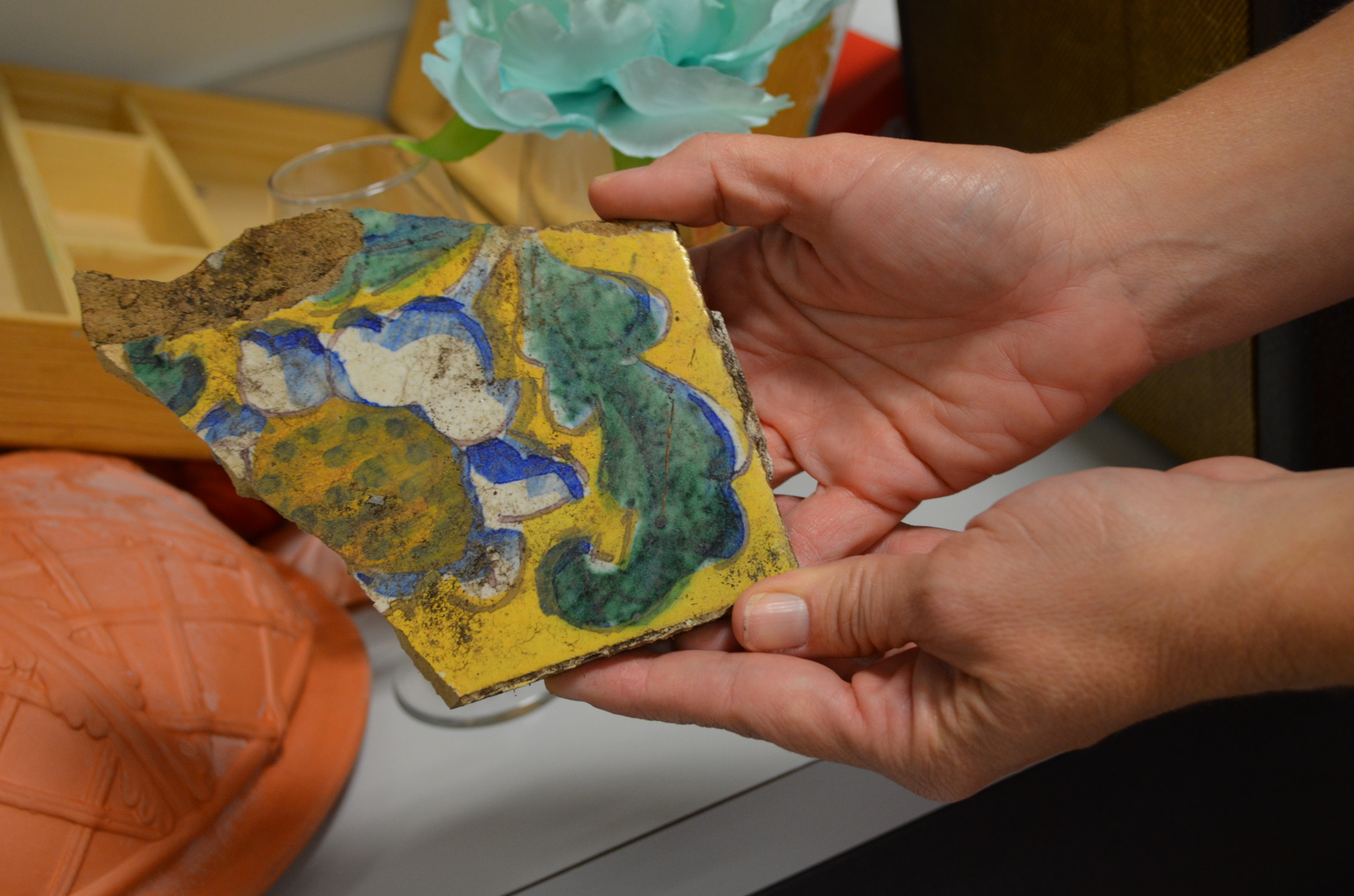 In preparing for MASHterpieces, Fraser and The Ringling employees discovered historic items in storage, including pieces of broken ceramic tile.
