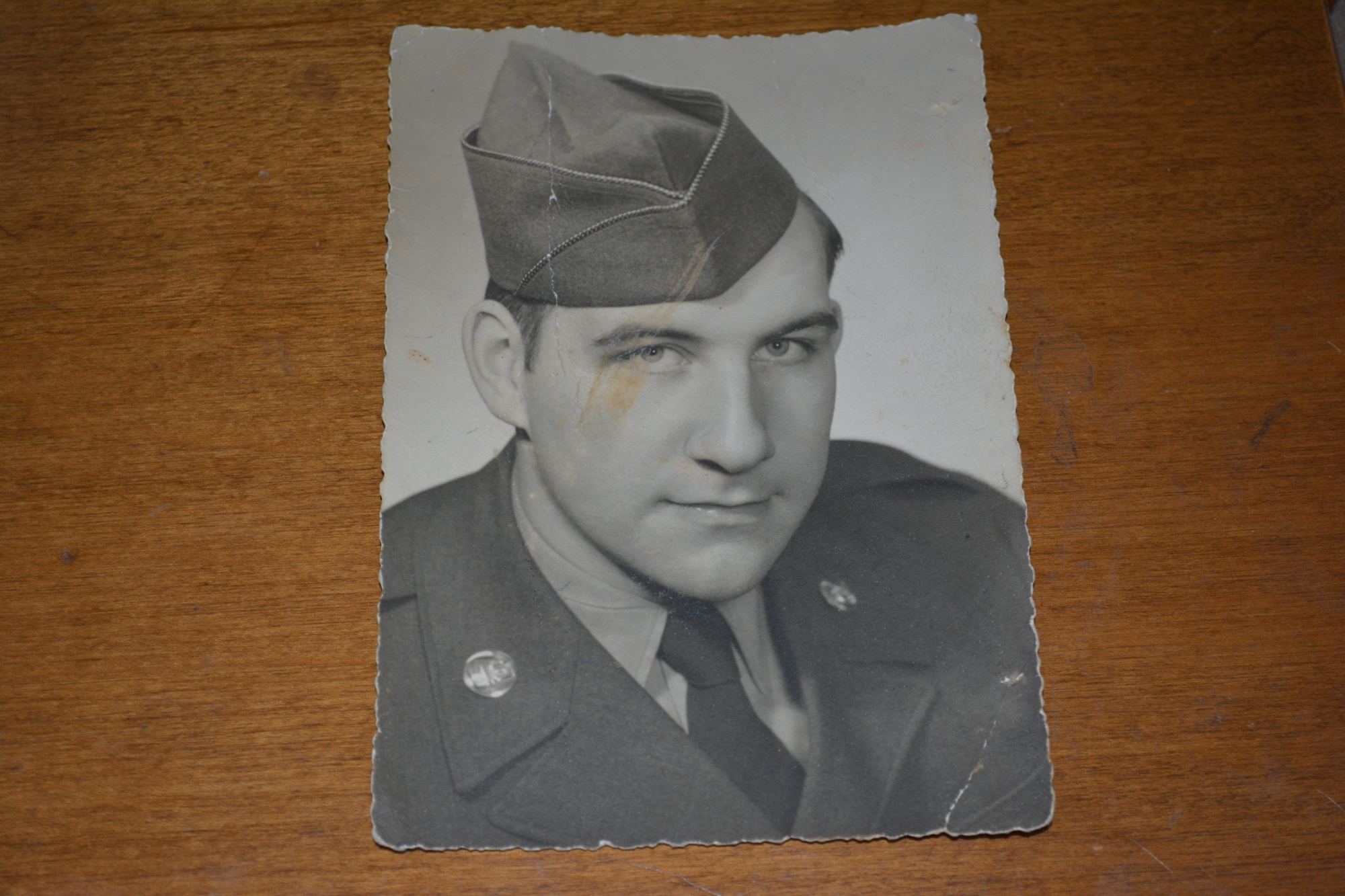 Frank Royer keeps a photo of himself while serving with the Army during the Korean War era.
