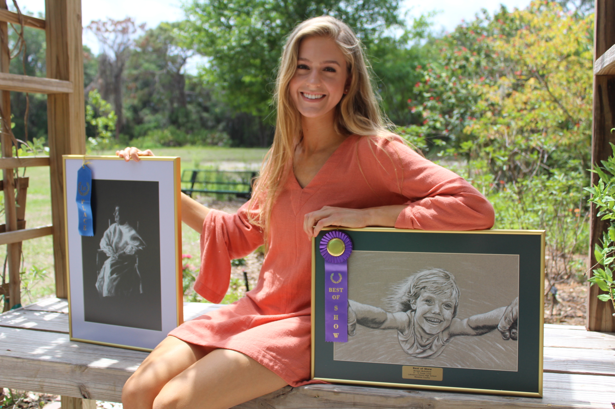 Lakewood Ranch High School graduate Morgan Mulholland holds two of her creations.