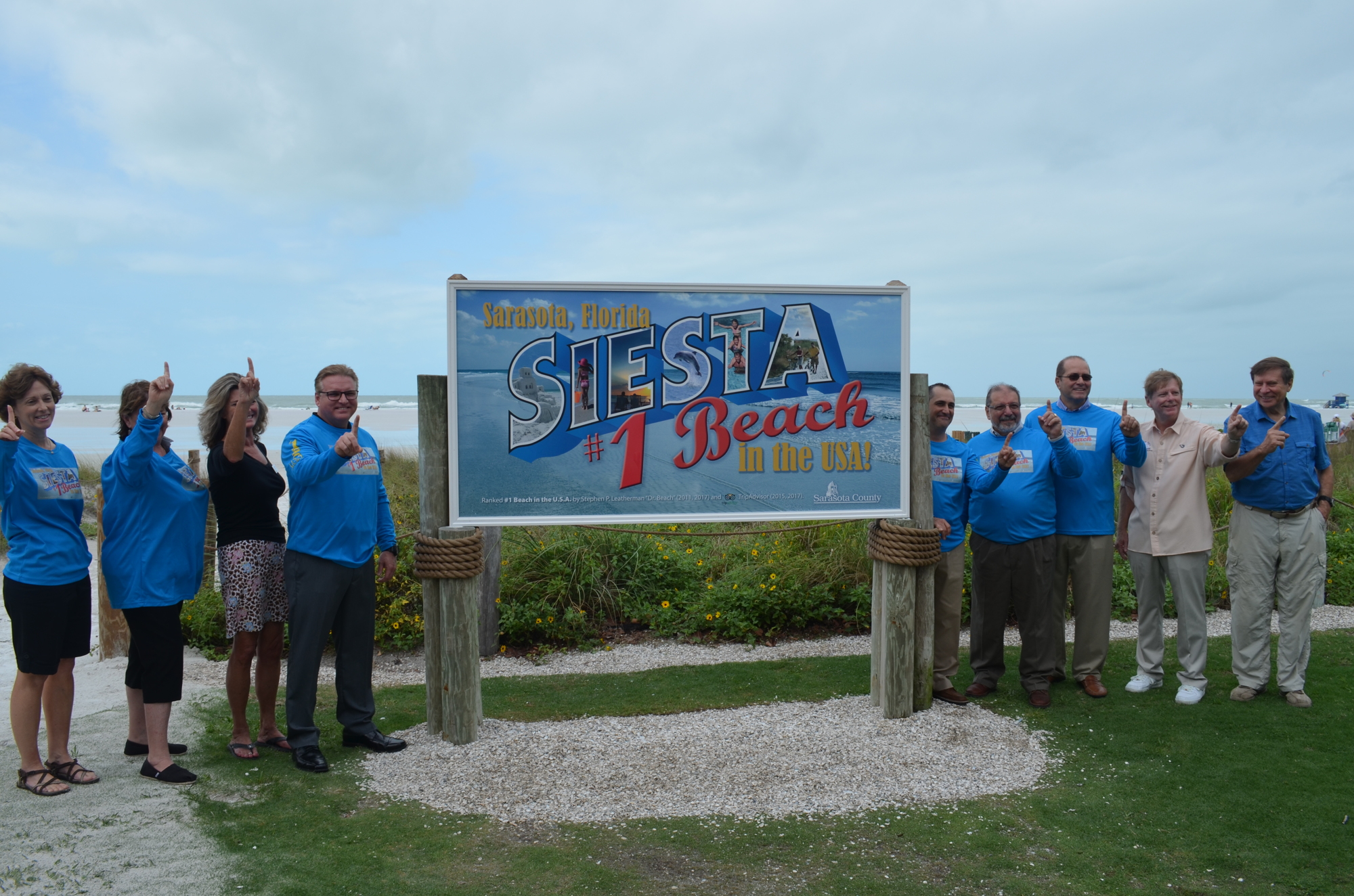 County officials, alongside Stephen Leatherman, unveiled a new sign at Siesta Key Beach on Thursday recognizing the beach's latest honor.
