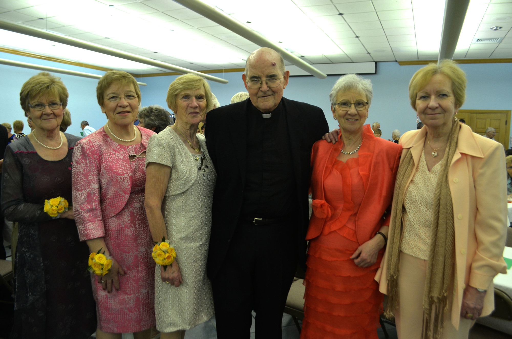 The Rev. Gerry Finegan with his five sisters Áine Connelly, Catherine O’Leary, Mary Tunney, Brigid Duffy and Josephine Finegan at his golden jubilee celebration on May 7.