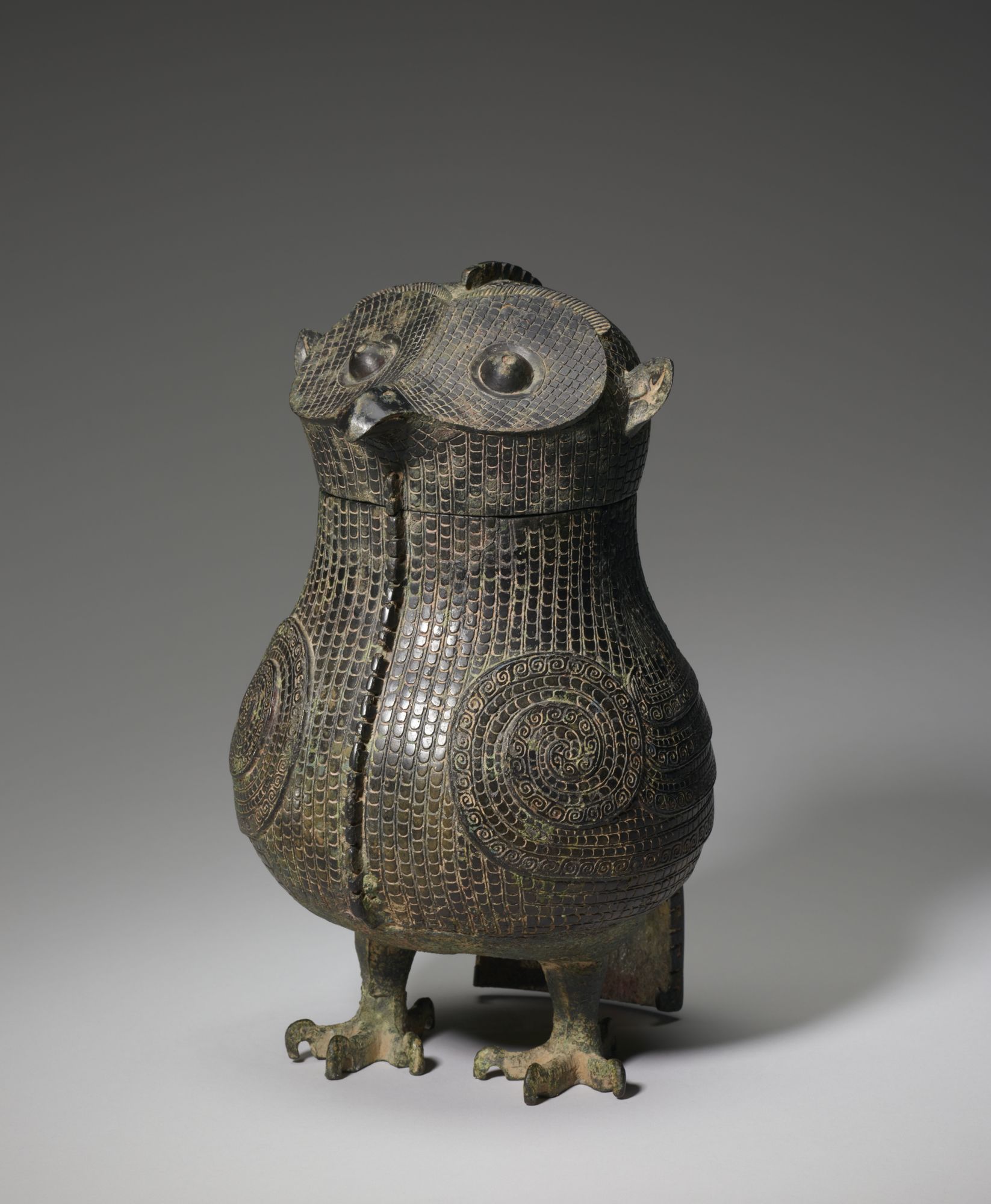 This ornate bronze wine vessel in the shape of an owl dates back to the 13th century BCE.