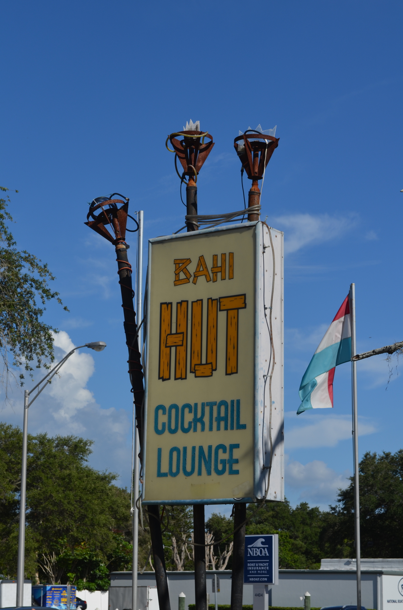 Proposed updates to the Bahi Hut include lighting the original torches on the roadfront sign along U.S. 41.