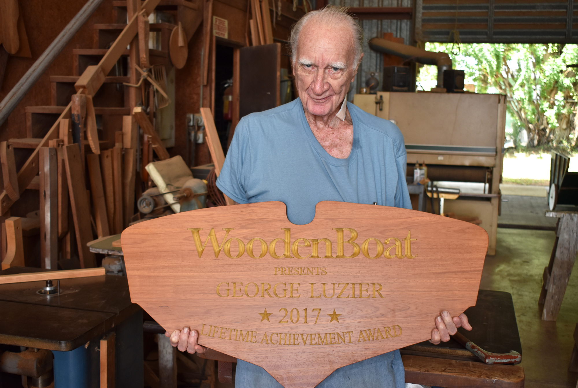 WoodenBoat Magazine recognized George Luzier with a Lifetime Achievement Award in July for 80 years of work. Photo by Niki Kottmann