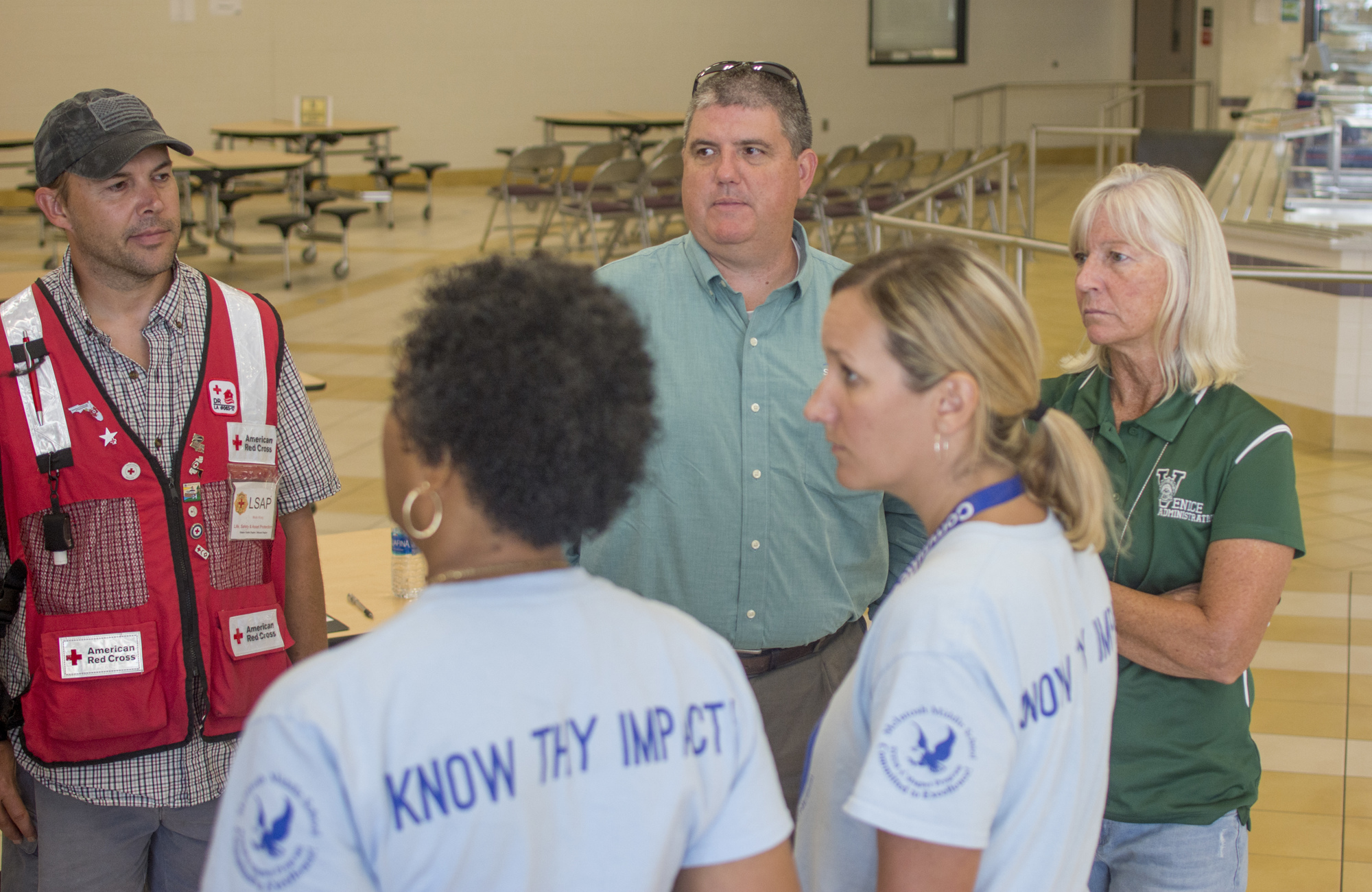 Todd Bowden consults with shelter staff.