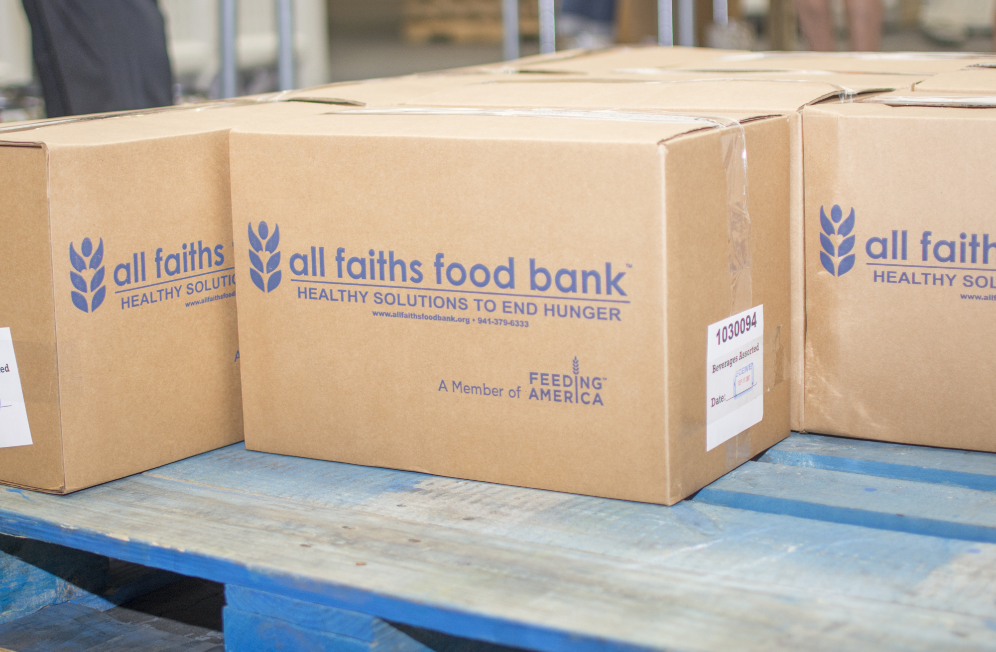 All Faiths Food Bank volunteers are packing disaster boxes for those in immediate need.