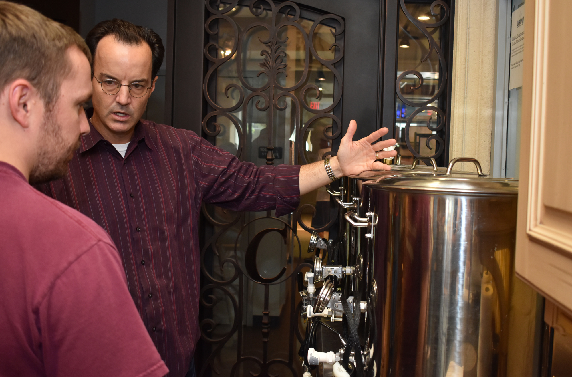 Instructor Joe Askren explains what the in-house Blichmann BoilerMaker does in the process of home brewing at the USFSM Culinary Innovation Lab. Photo by Niki Kottmann