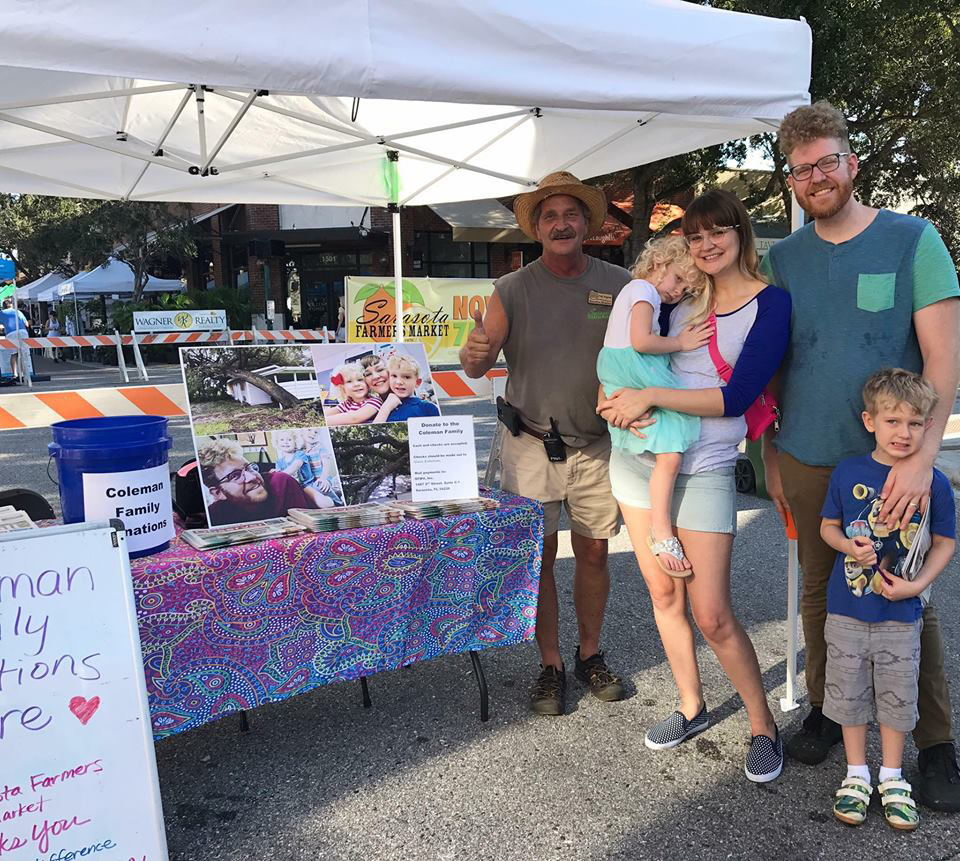 Phil Pagano poses with Juniper, Ciera, Jesse and Calvin Coleman. The Farmers Market hosted a benefit for the family after a large tree fell on their home during Hurricane Irma. 