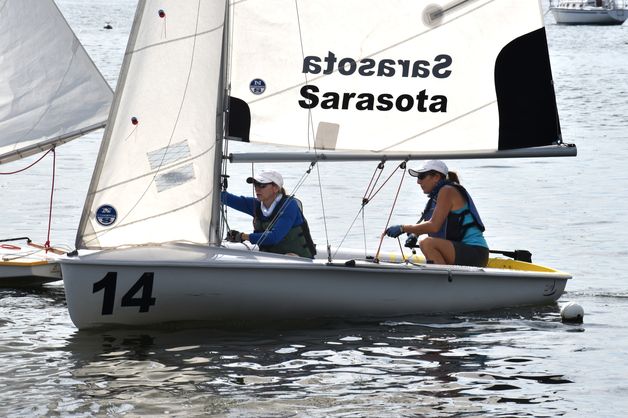 Jacki Booker [on the left] sets out to sail Sarasota Bay with fellow Luffing Lassies on Sept. 21.