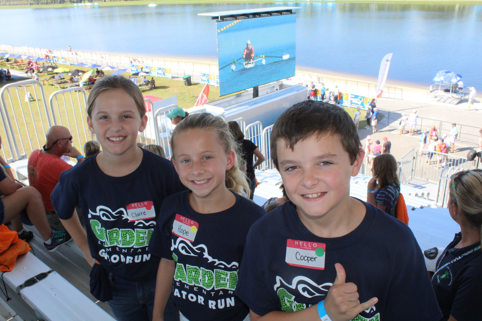 Garden Elementary School fifth-graders Claire Timmerman, Hope Hirtzel and Cooper McGowan drew the U.S. art portrait that sits on display at the World Rowing Championship venue.