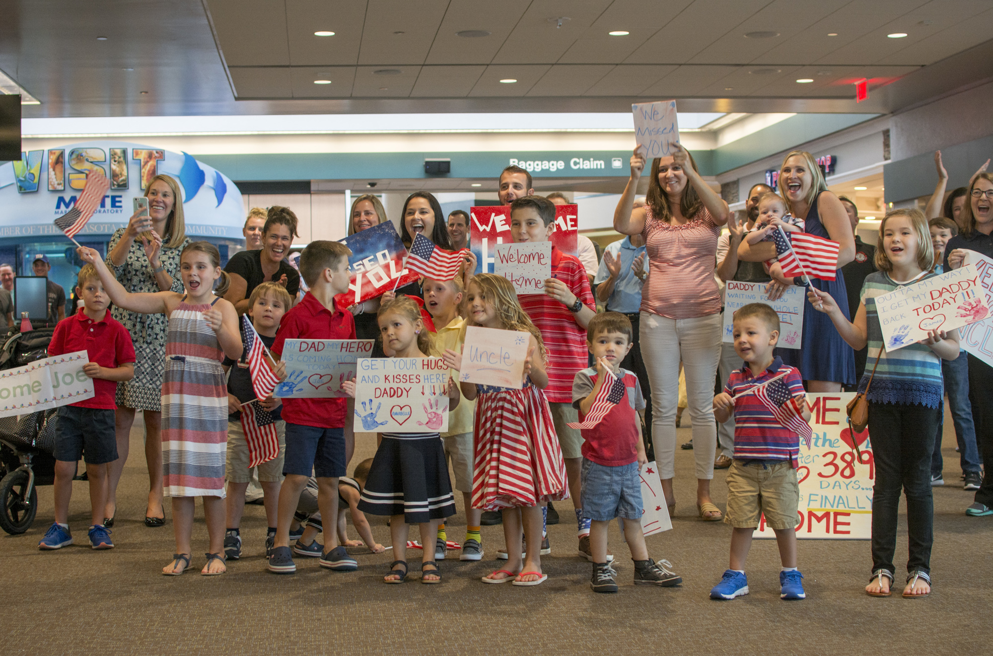 Family and friends gathered at Sarasota-Bradenton International Airport to welcome Commander Joe Hembree home from a more than one year long deployment in Djibouti.