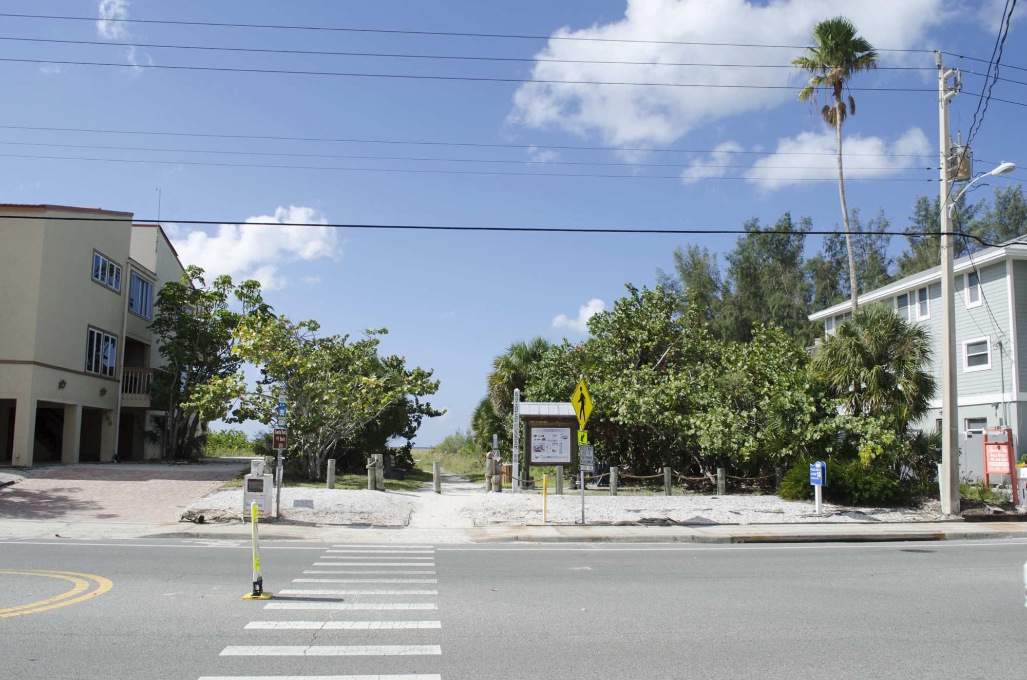The view of beach access 10 from the street. At this time, cars can't drive onto the access. 