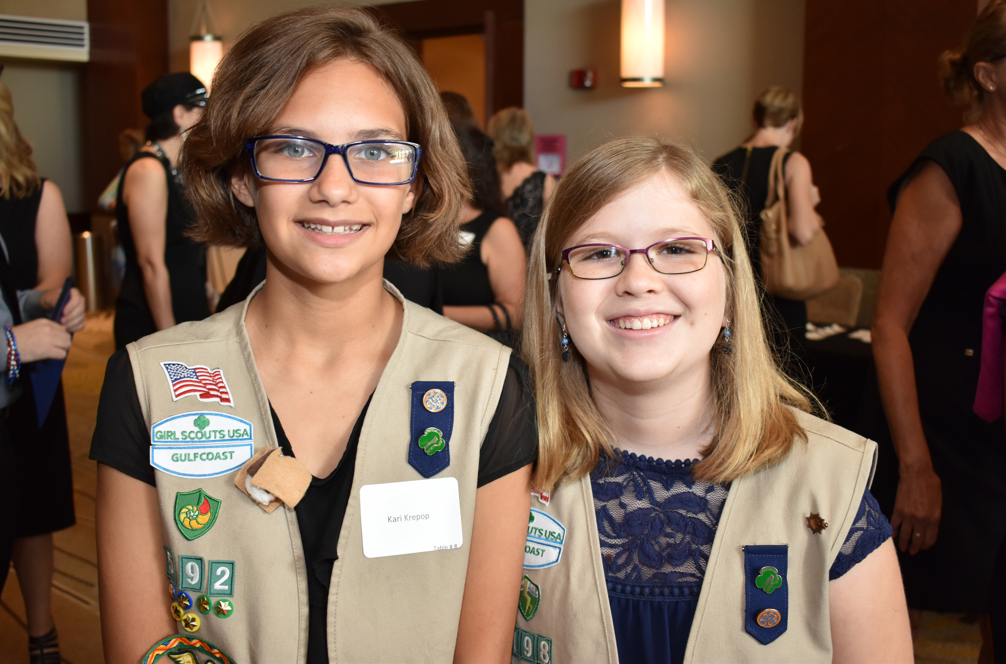 Kari Krepop, a member of Girl Scout Troop #592, and Allison Carchio, a member of Girl Scout Troop #198, were among the scout members who participated in the Salute the Runway fashion show July 13 at Hyatt Regency Sarasota.