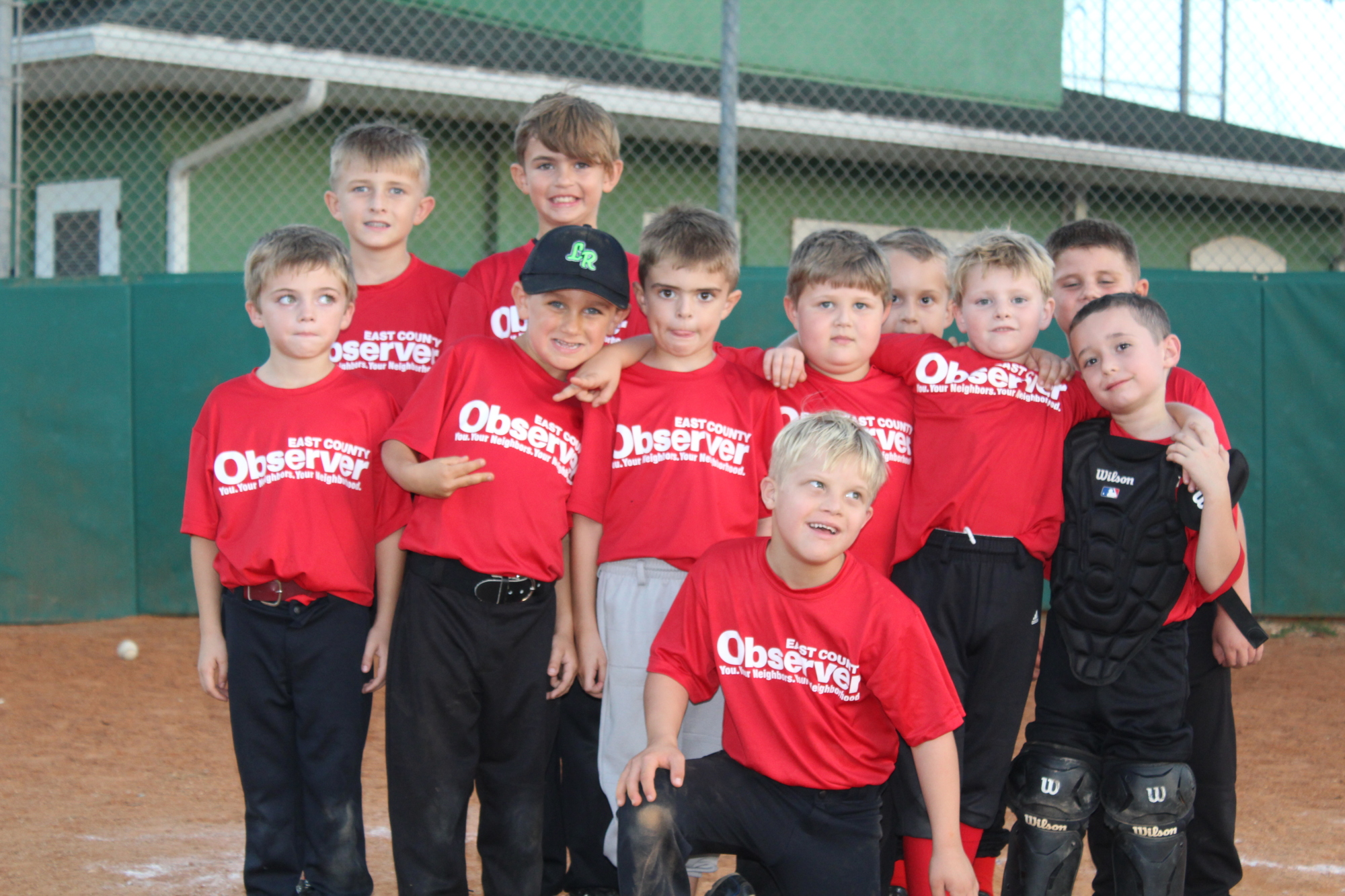 The East County Observer Little League team includes Cameron Cody (front), who has Down syndrome.