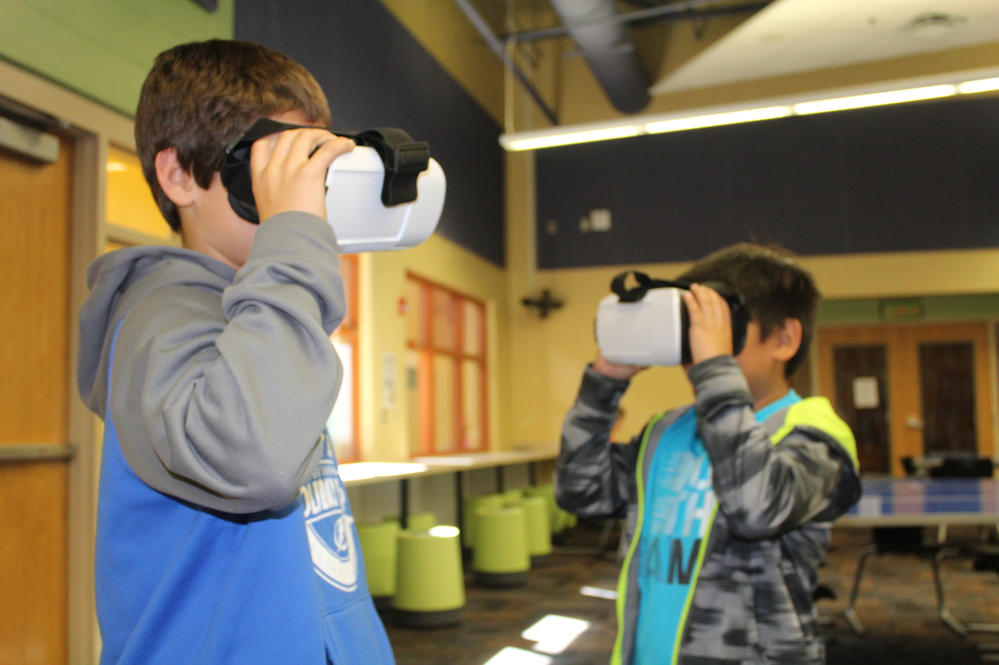 McNeal Elementary School third-graders Michael Geaglone and Kaden Oda go on a virtual reality adventure. Their teacher, Carolyn Wingnet, will purchase new VR sets and iPods with the grant money from the Manatee Education Foundatio