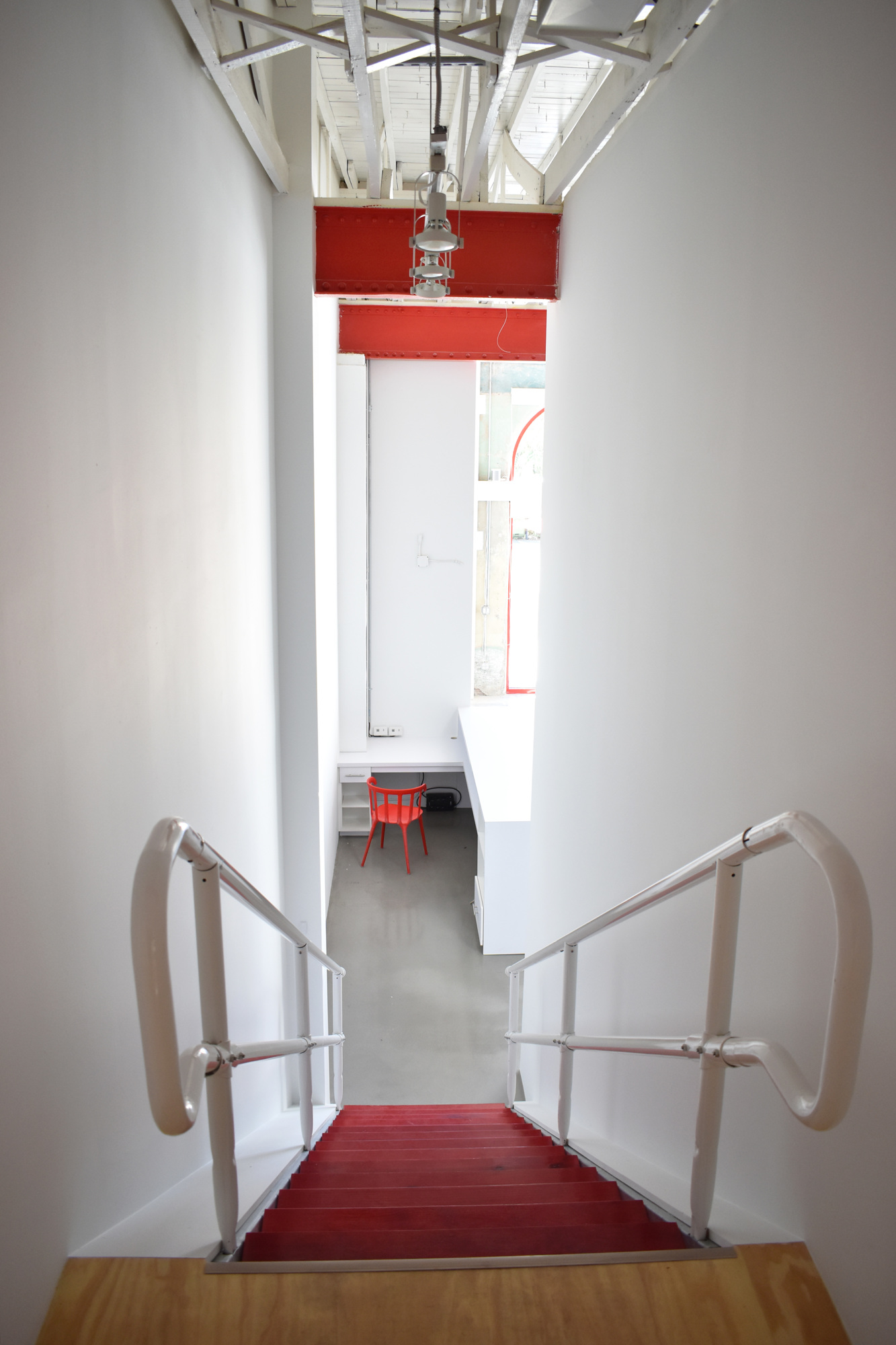 The staircase that was once in the back of the gallery was moved to the front for easy access to the collector’s room and office space. Photo by Niki Kottmann