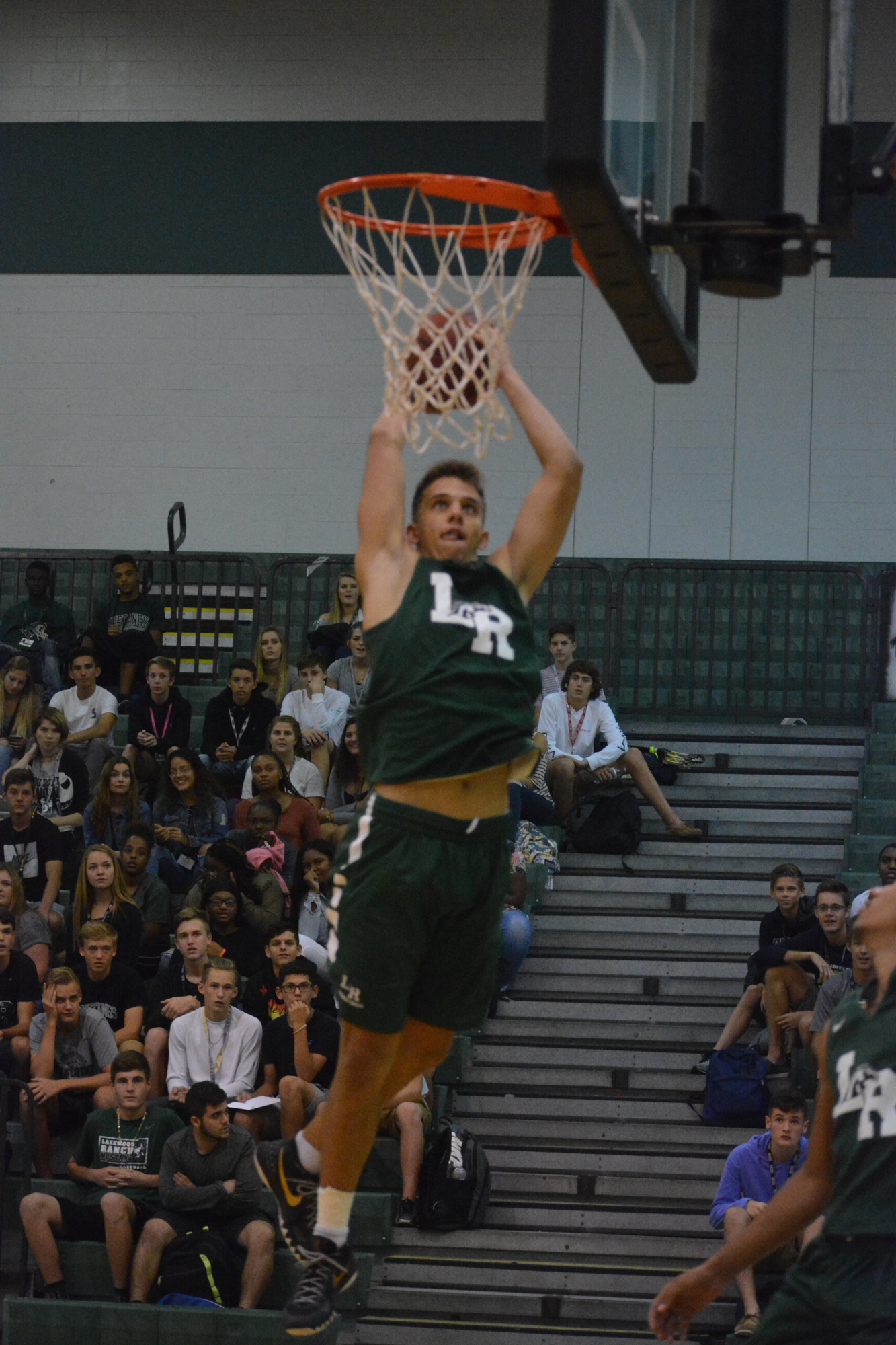 Mustangs senior Jack Kelley won the dunk contest in part thanks to this baseline slam.
